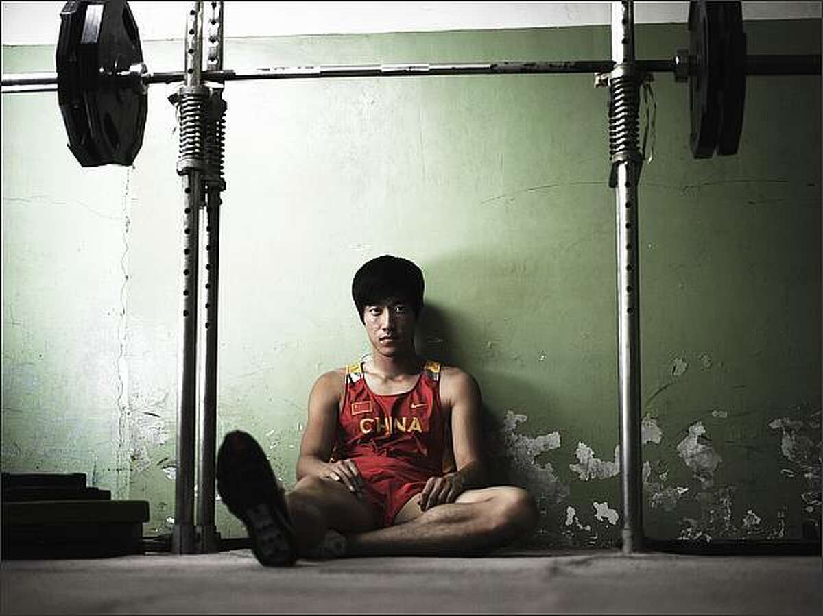 Liu Xiang poses for a portrait shoot at the National Sports Training Centre in Beijing, China.