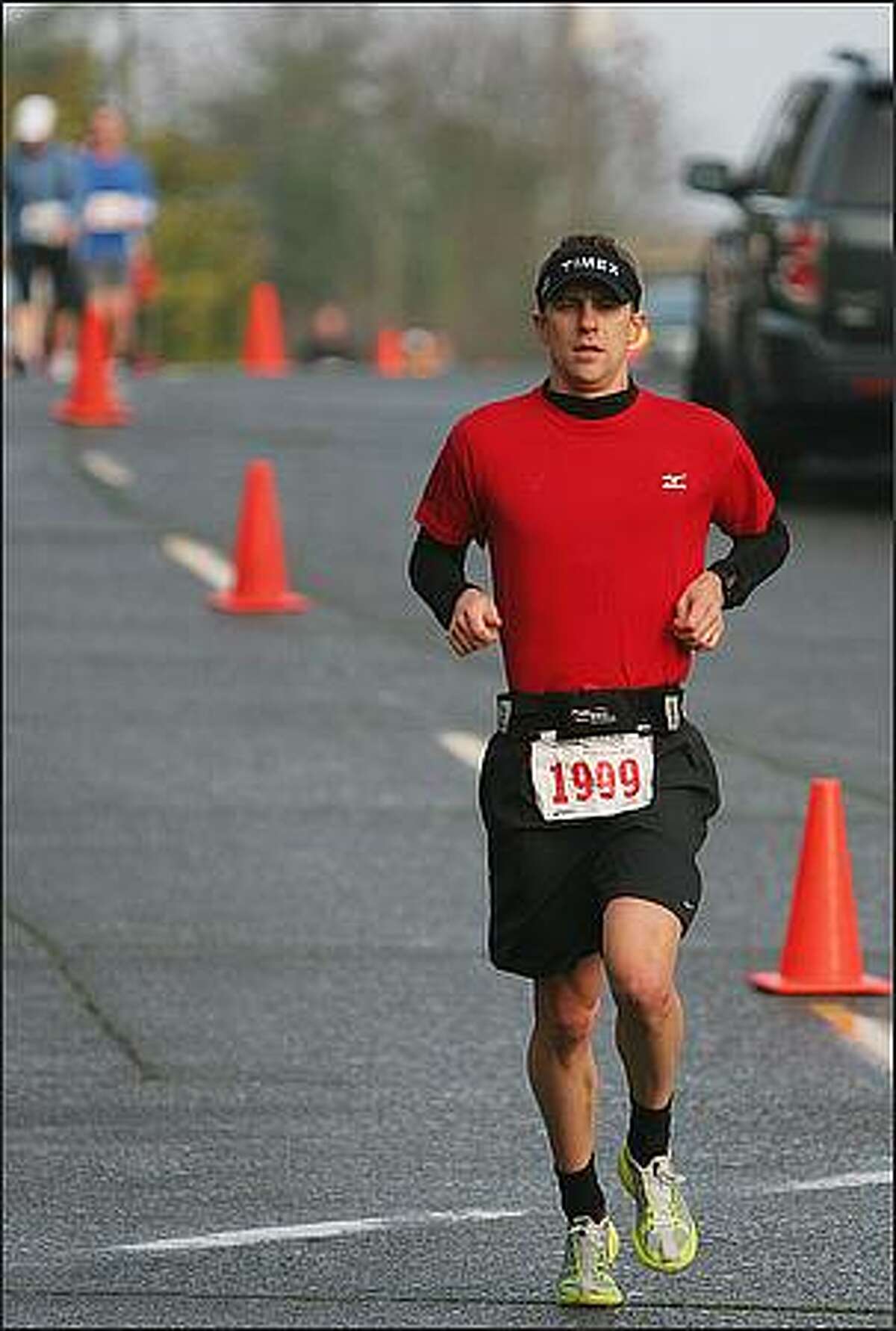 A runner participates in the 2008 Seattle Marathon.