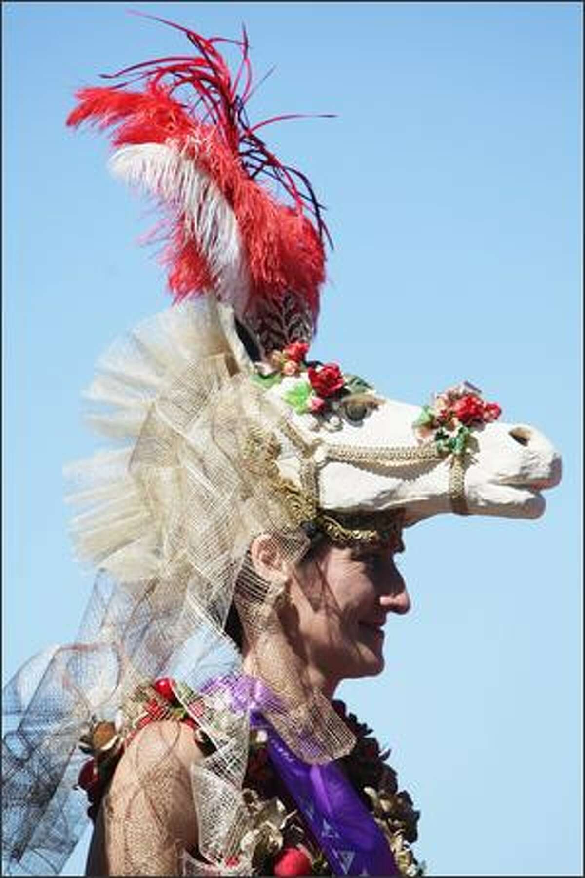Joelle March displays her head piece during the New Zealand Herald Christmas Carnival meeting at Ellerslie Racecourse on Friday in Auckland, New Zealand.