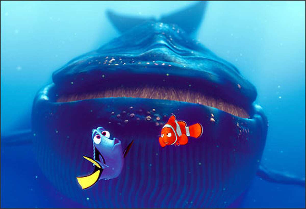 Dory (left) and Marlin (center) encounter a blue whale.