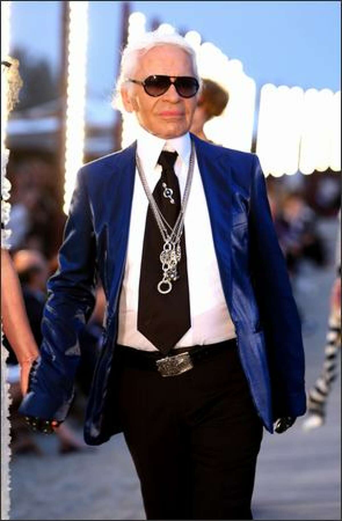 Designer Karl Lagerfeld walks the runway during the Chanel Cruise 2010 Fashion Show in Venice, Italy, on Thursday, May 14, 2009. Lagerfeld is the head designer at the venerable French couture house.