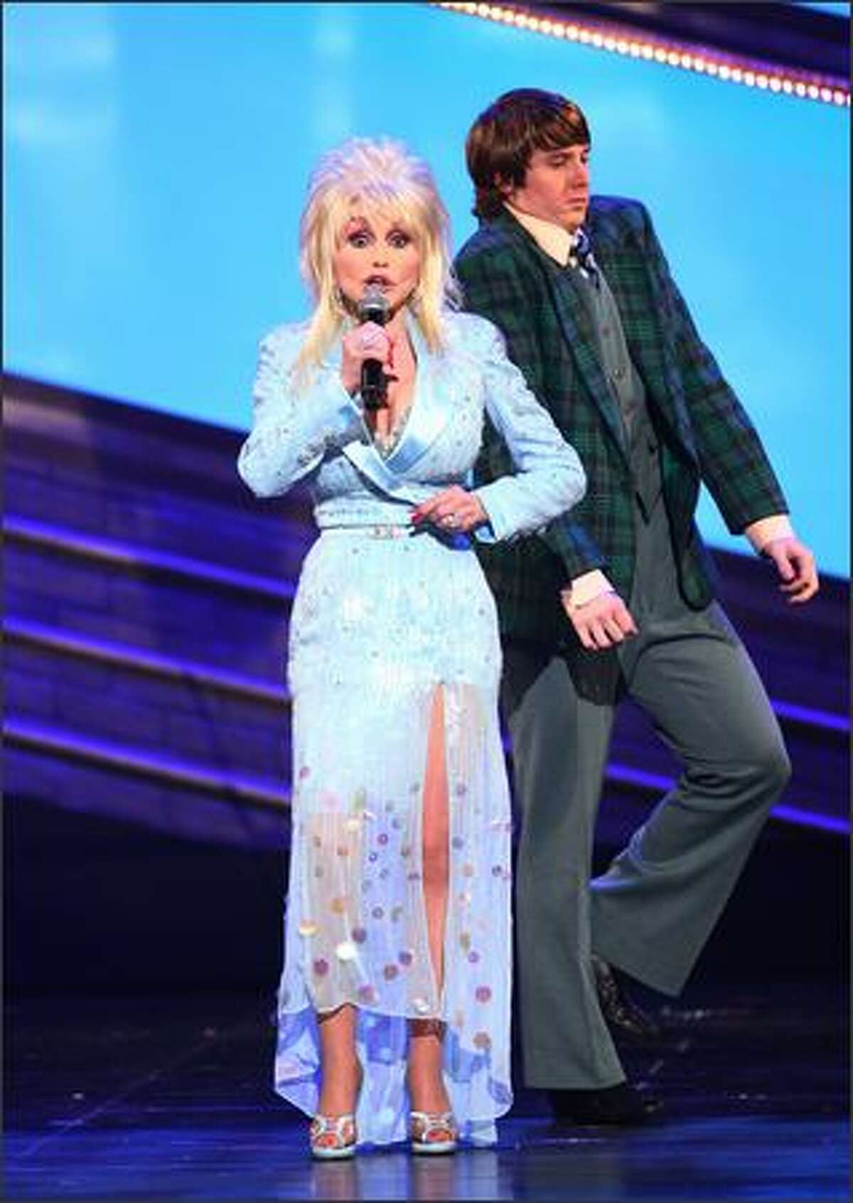 Singer Dolly Parton performs a song from "9 to 5" the musical onstage during the 63rd Annual Tony Awards at Radio City Music Hall on Sunday in New York City.