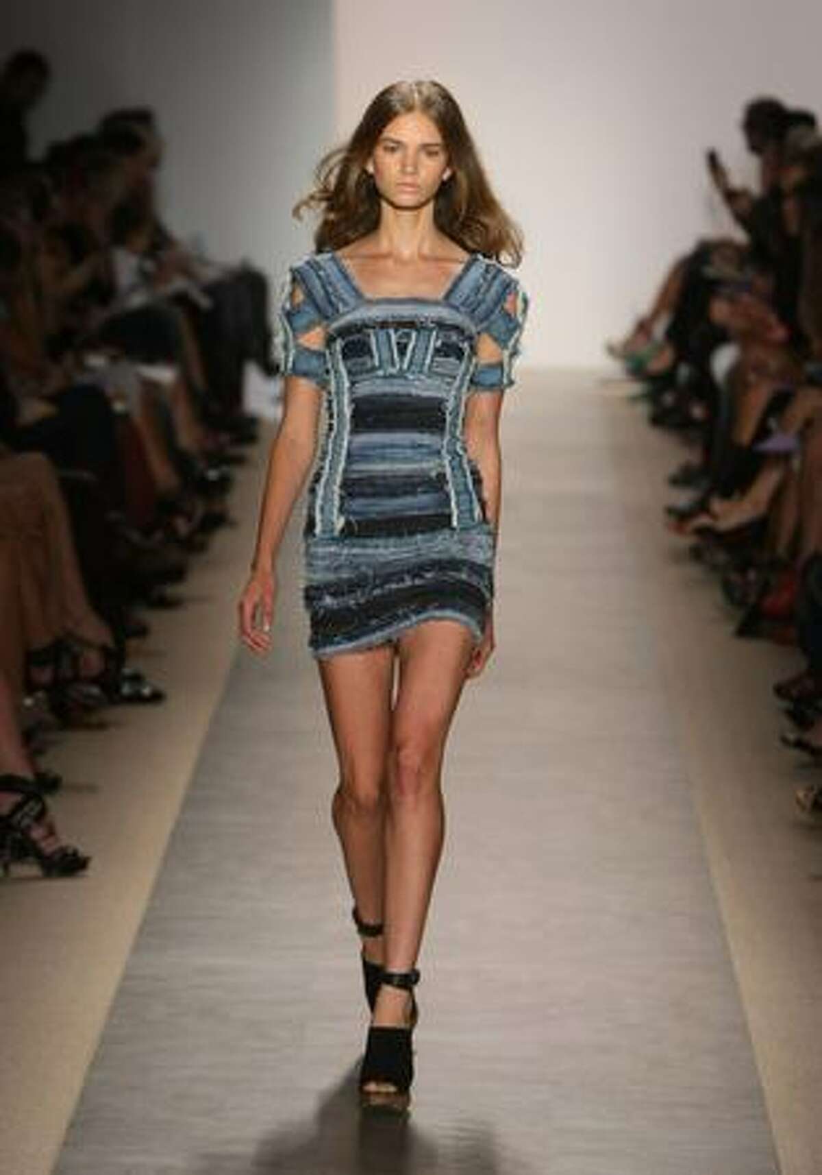 A model walks the runway during the the Herve Leger Spring 2010 Fashion Show at the Promenade at Bryant Park on Sunday in New York City.