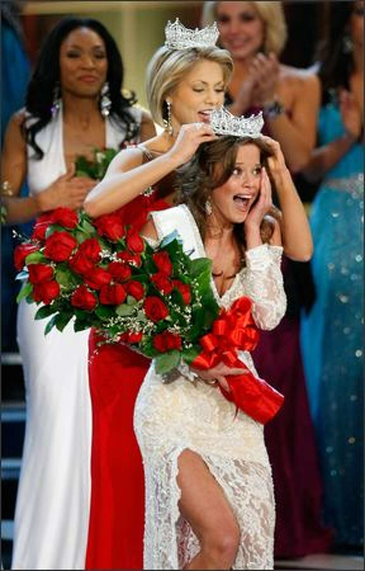 Miss America 2008 Kirsten Haglund crowns Katie Stam, Miss Indiana, the new Miss America.
