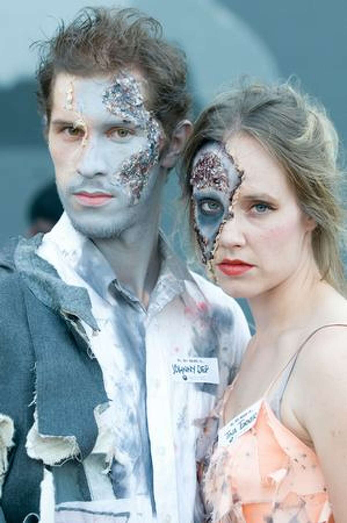 A couple of zombies pose during an attempt to break the Guinness World Record for largest zombie gathering in Fremont. Photo by Daniel Berman/SeattlePI.com