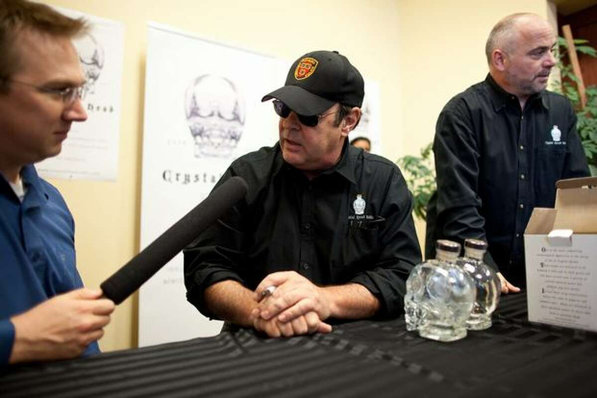 Aykroyd takes a break from signing bottles to talk to the press. He will be signing bottles at the University Village liquor store from 4 p.m. to 6 p.m. on Wednesday.
