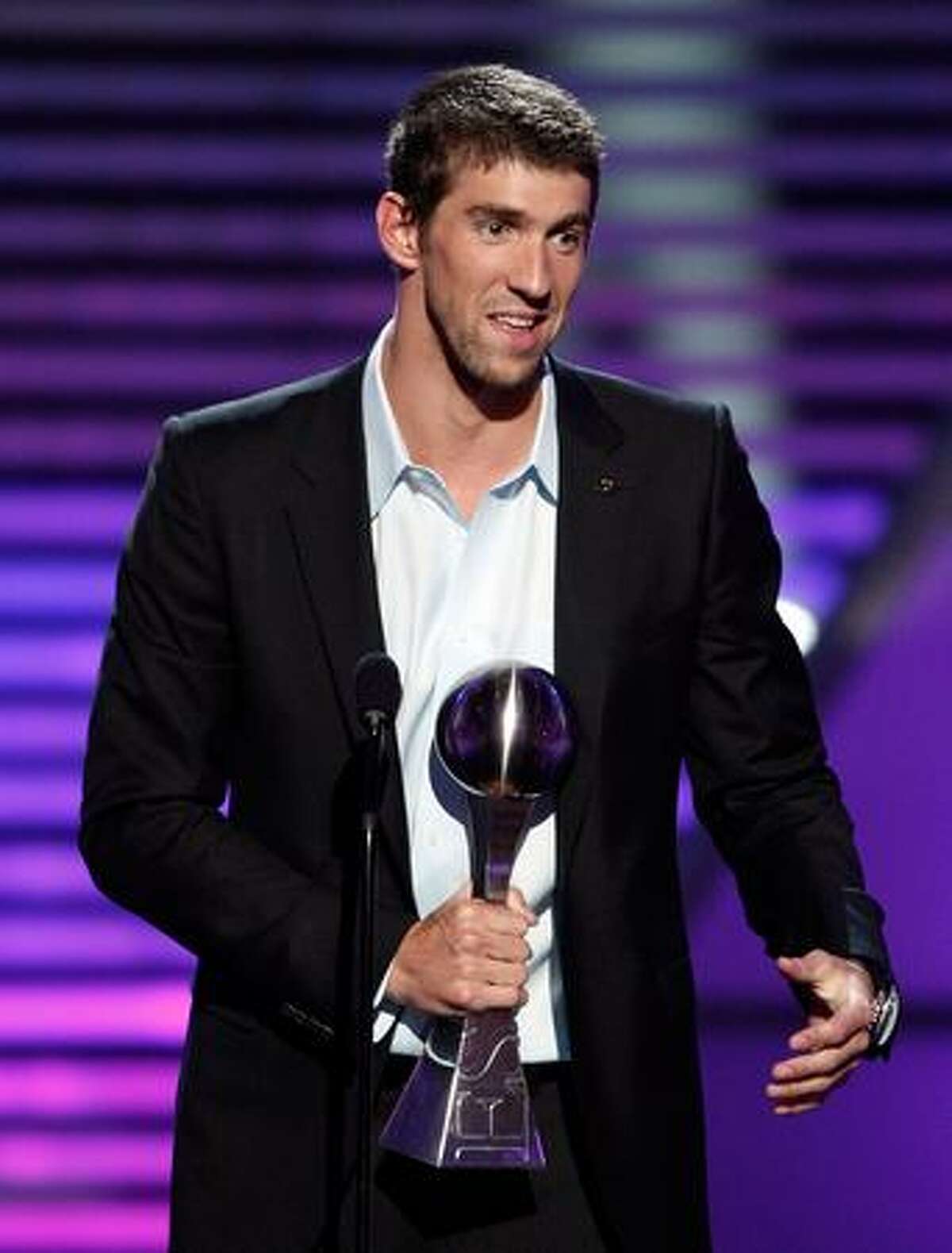 Olympic gold medalist swimmer Michael Phelps accepts the Best Championship Performance award onstage during the 2009 ESPY Awards held at Nokia Theatre LA Live in Los Angeles on Wednesday, July 15, 2009. The 17th annual ESPYs will air on Sunday, July 19 at 6 p.m. PDT on ESPN.