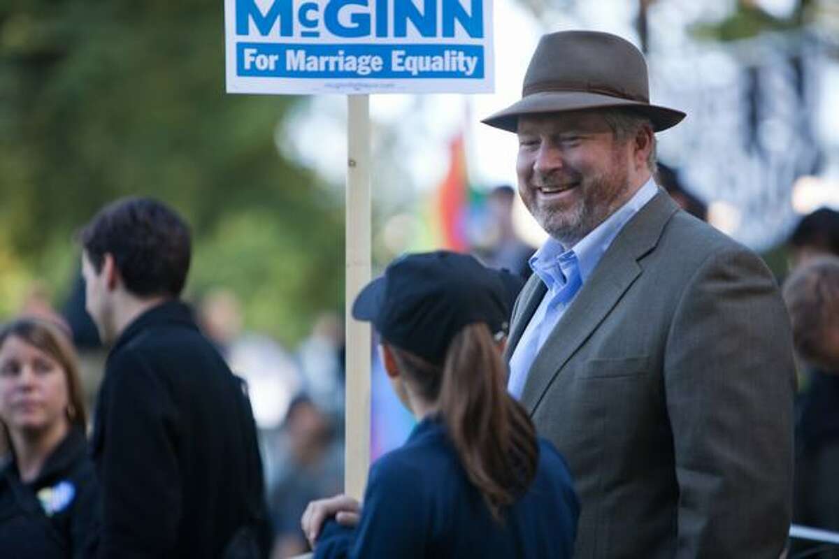 Mayoral candidate Mike McGinn attends a rally and march in support of Referendum 71 rally in Seattle's Volunteer Park on Sunday, Oct. 11, 2009.