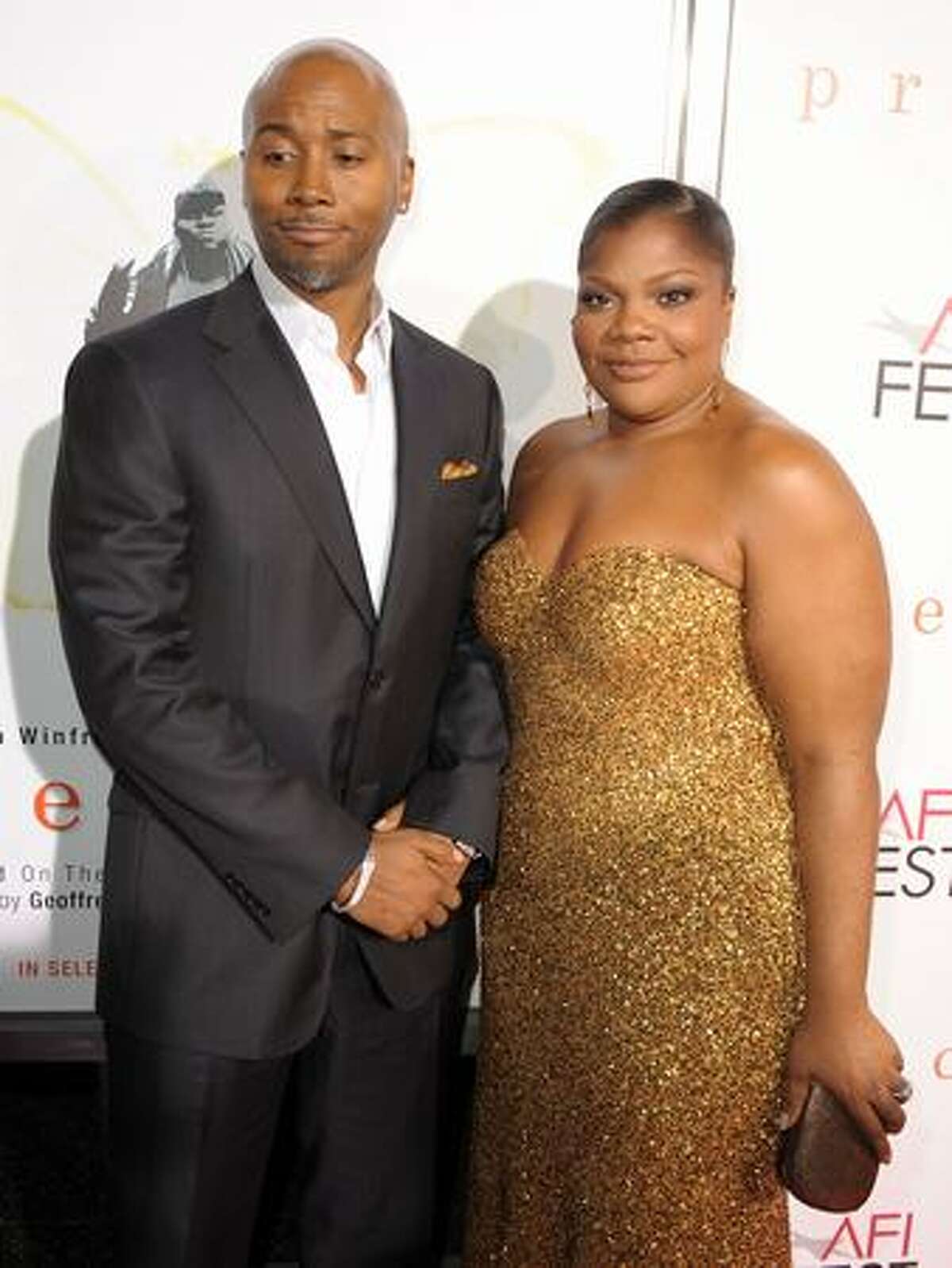 Sidney Hicks (L) and actress Mo'Nique arrive at the screening of "Precious: Based On The Novel 'PUSH' By Sapphire" during AFI FEST 2009 held at Grauman's Chinese Theatre in Hollywood, California.