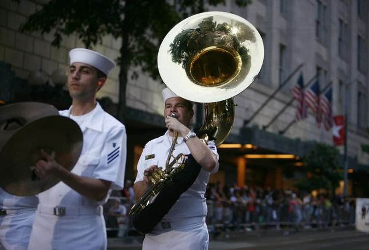 A U.S. Navy marching band performs during the Seafair Torchlight parade on Saturday July 25, 2009 along 4th Avenue in Seattle.
