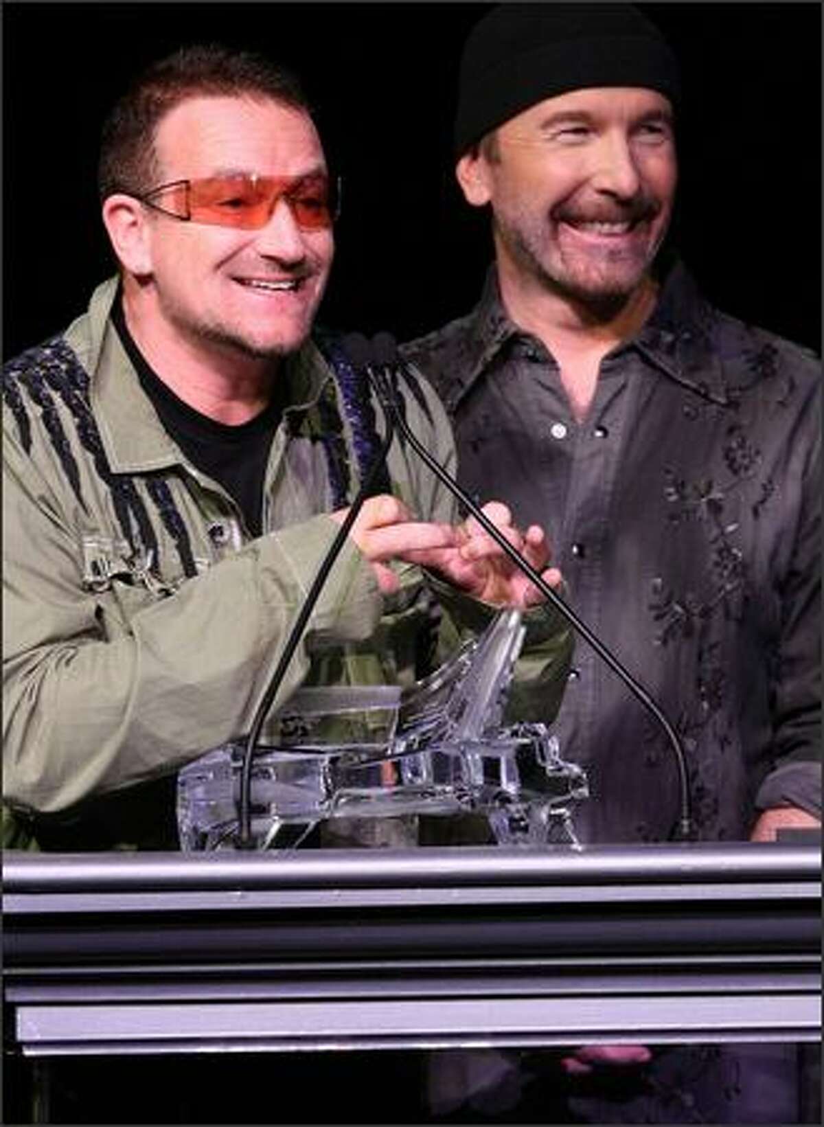 Musicians Bono and The Edge of U2 onstage during the Thelonious Monk Institute of Jazz honoring B.B. King event held at the Kodak Theatre on October 26, 2008, in Los Angeles, California. (Getty)