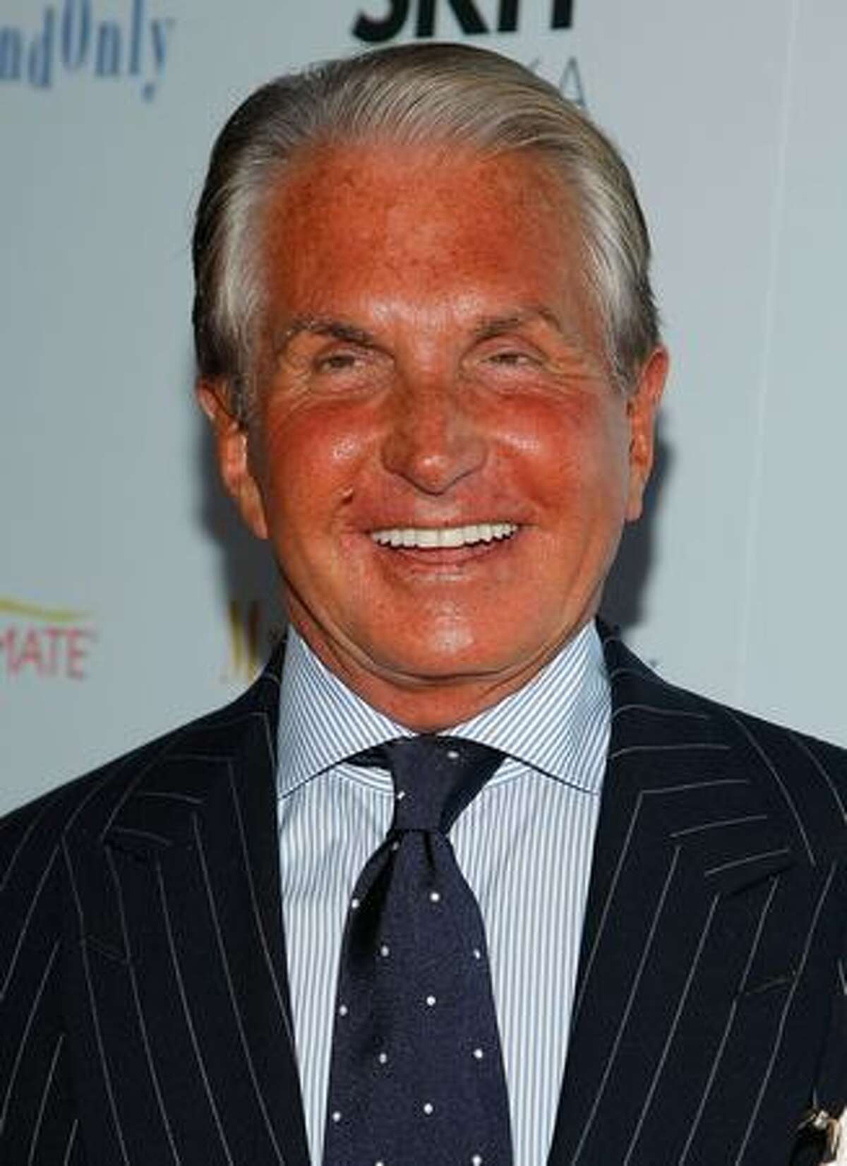 Actor George Hamilton attends the premiere of "My One And Only" at the Paris Theatre in New York City.