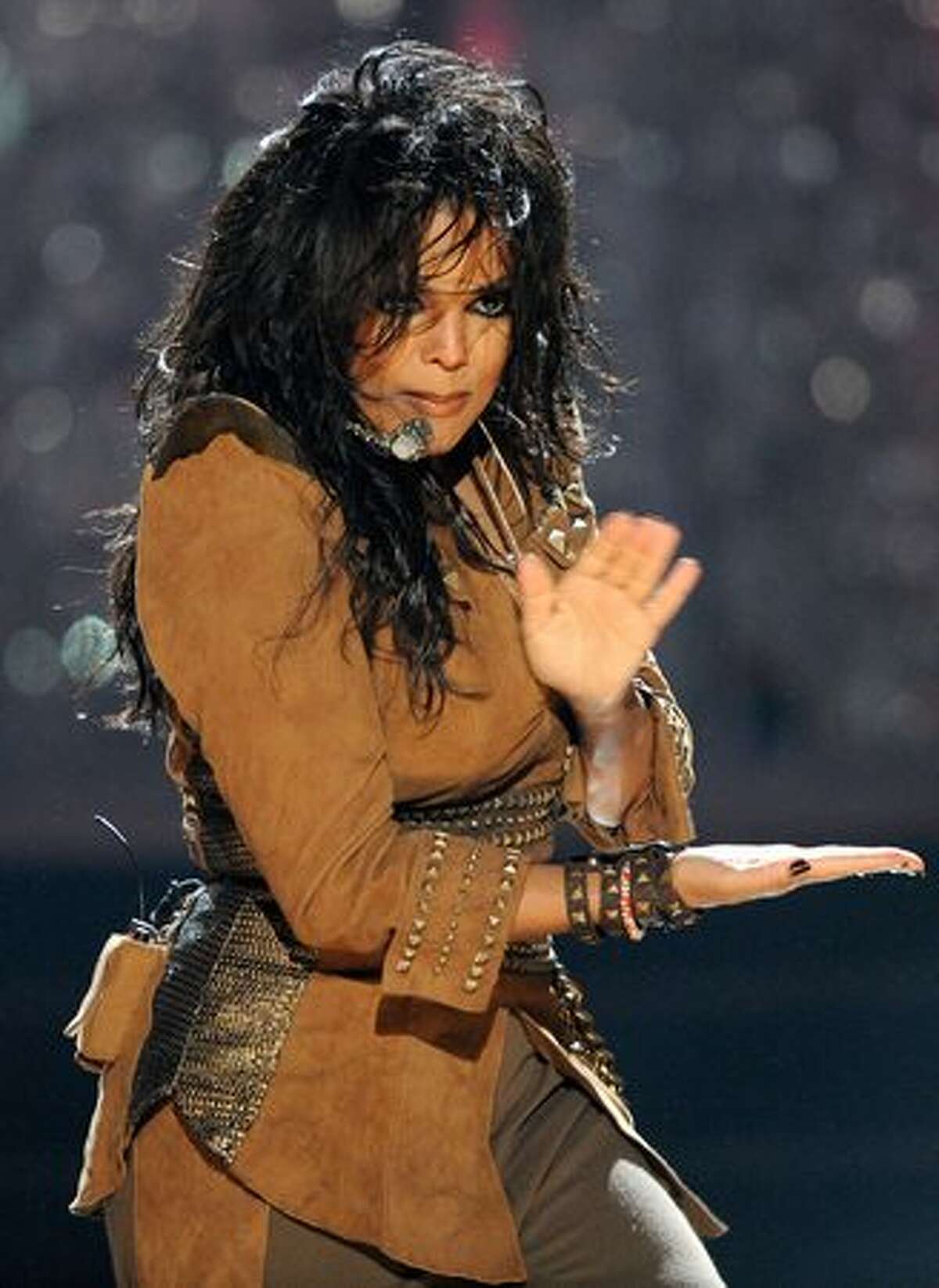 Singer Janet Jackson performs onstage.