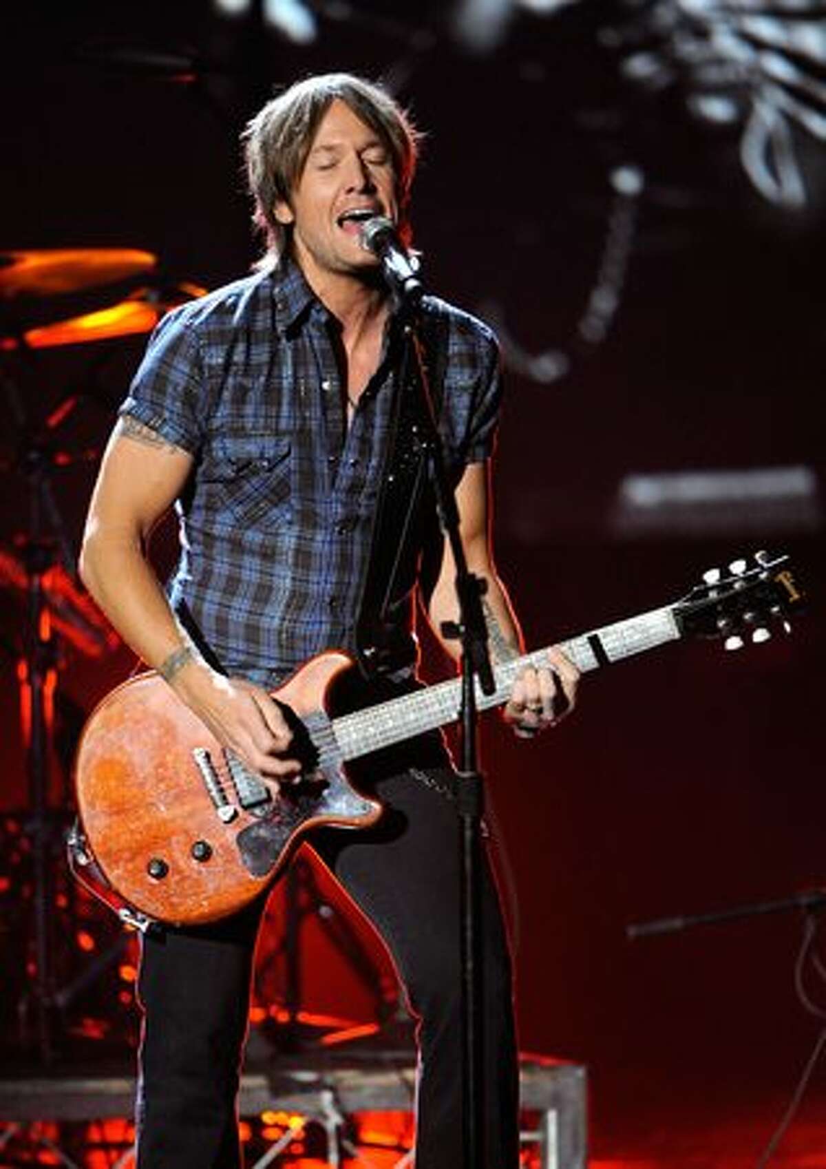 Musician Keith Urban performs onstage.