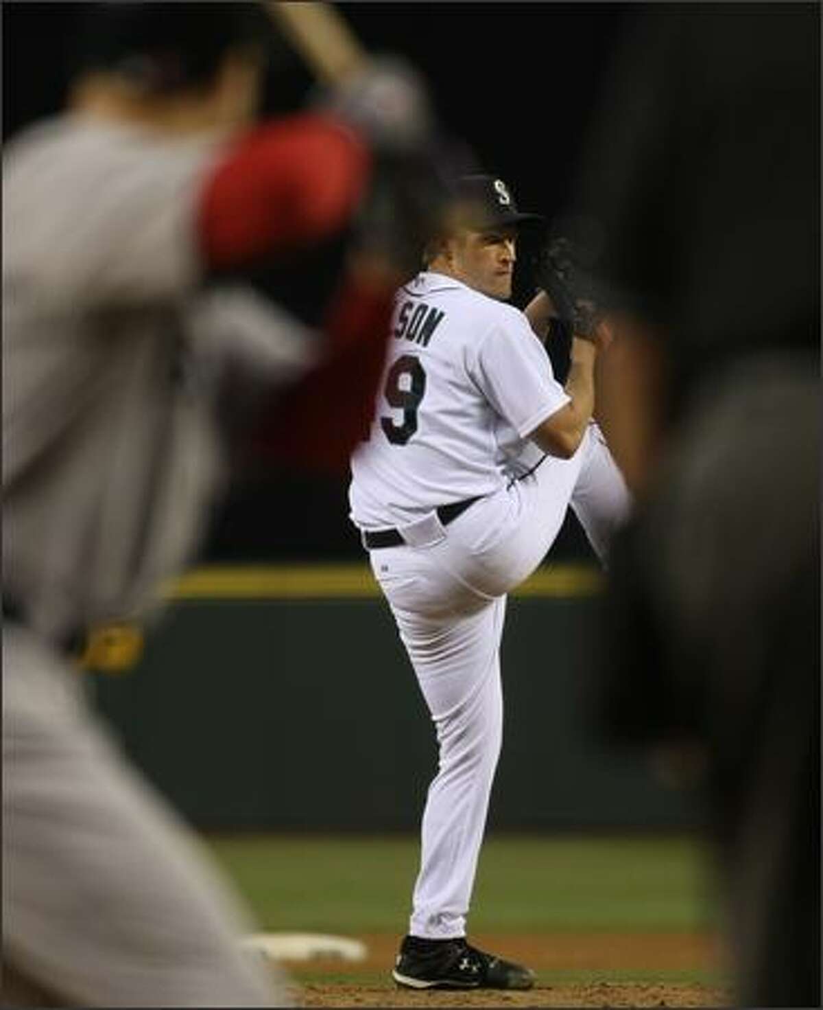 Garrett Olson pitches during the 5-3 loss to the Boston Red Sox at Safeco Field.