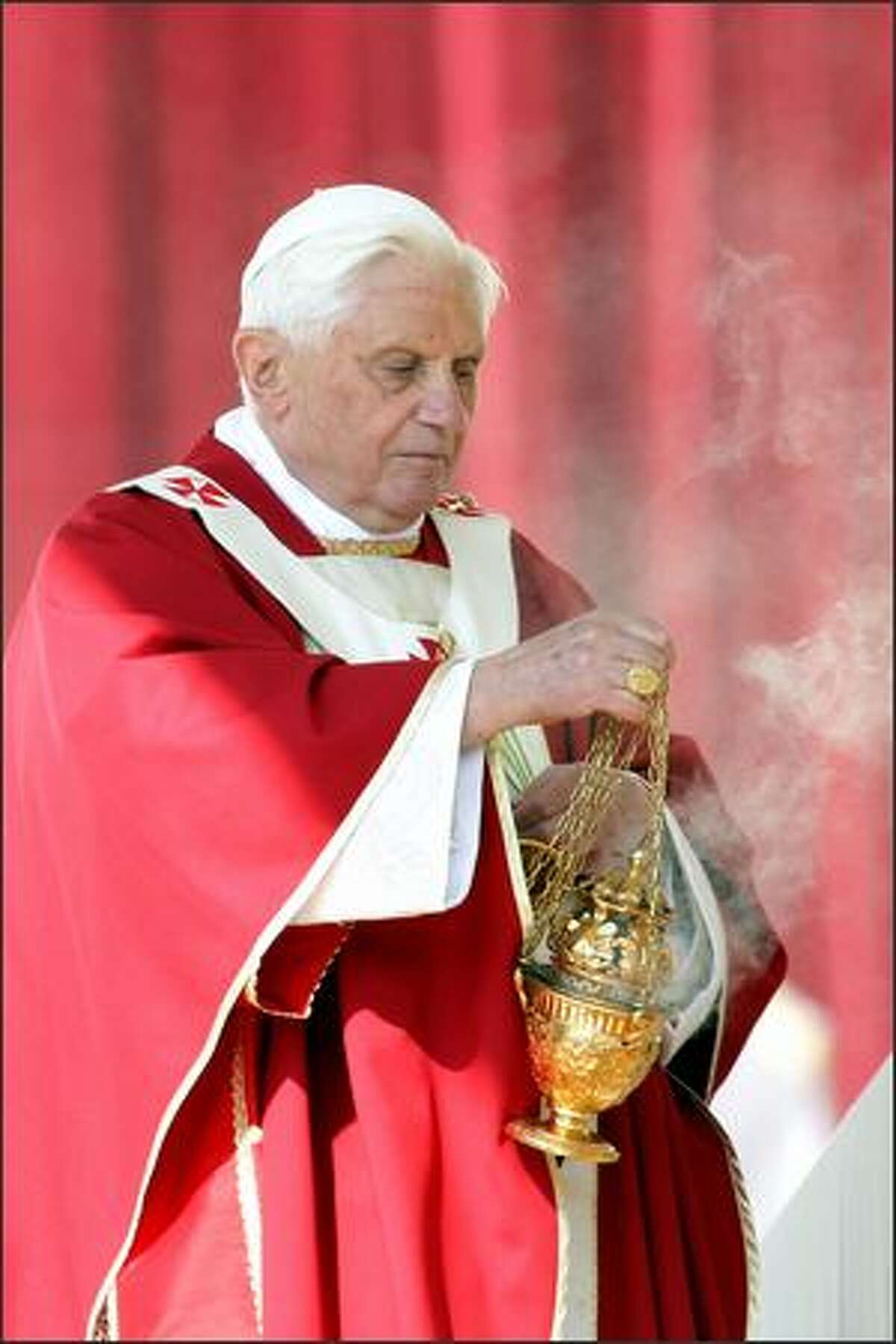 Pope Benedict XVI attends the Palm Sunday service in Saint Peter's Square on April 5, 2009 in Vatican City, Vatican.