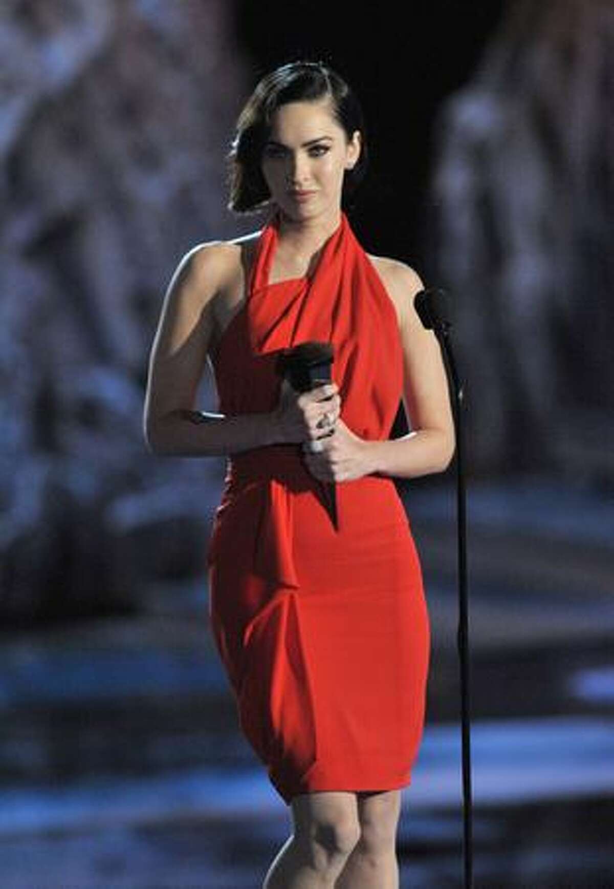 Actress Megan Fox accepts the Best Sci-Fi Actress award onstage.