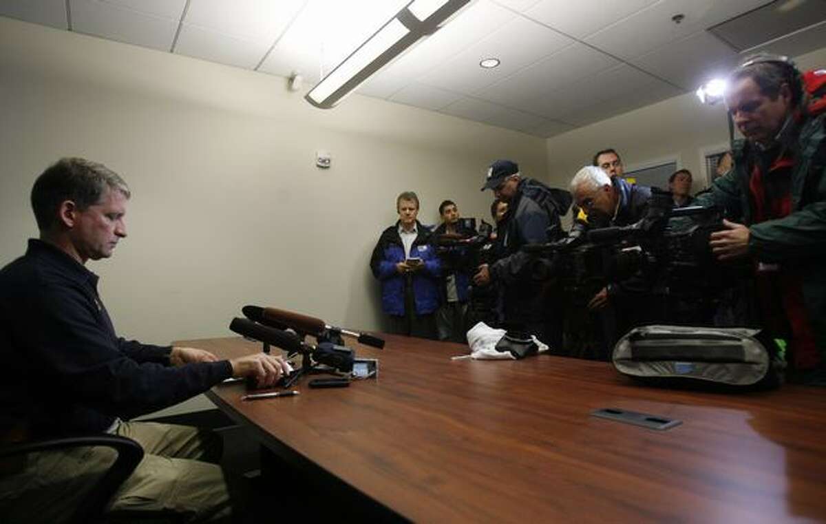 Assistant Seattle Police Chief Jim Pugel prepares to brief reporters on developments in the shooting death of Officer Tim Brenton and wounding of Officer Britt Sweeney. The suspect, Christopher J. Monfort, was shot Friday at his Tukwila apartment. Follow this link to hear audio from the briefing.