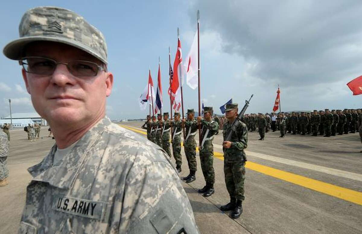 A member of the U.S. Army stands guard during the opening ceremony of the annual combined military exercise Cobra Gold 2010 at U-Tapao airport in Rayong province, Thailand, on Feb. 1, 2010.