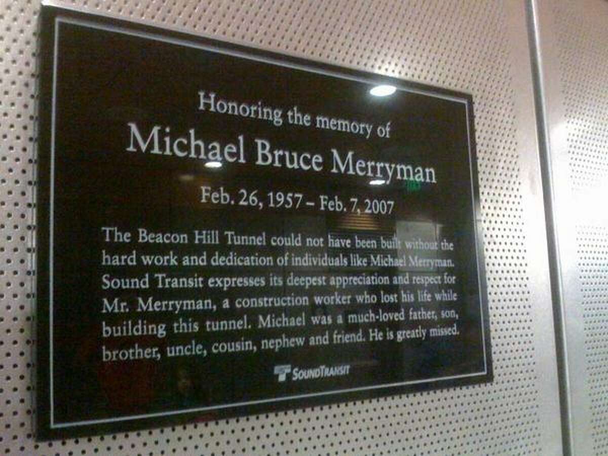 A plaque pays tribute to construction worker Michael Bruce Merryman, who died during the construction of the Beacon Hill Tunnel.