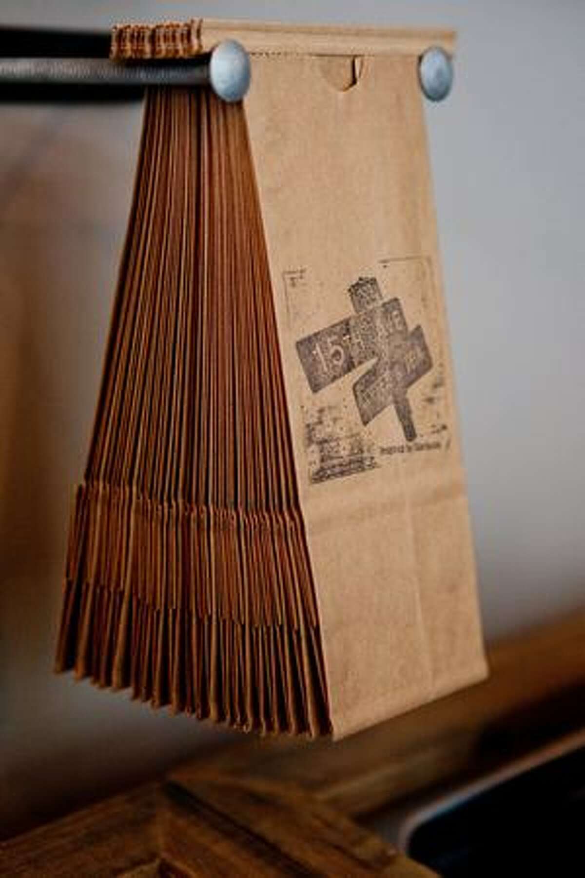 Coffee bags hang at Starbucks' new 15th Avenue Coffee & Tea on Capitol Hill.