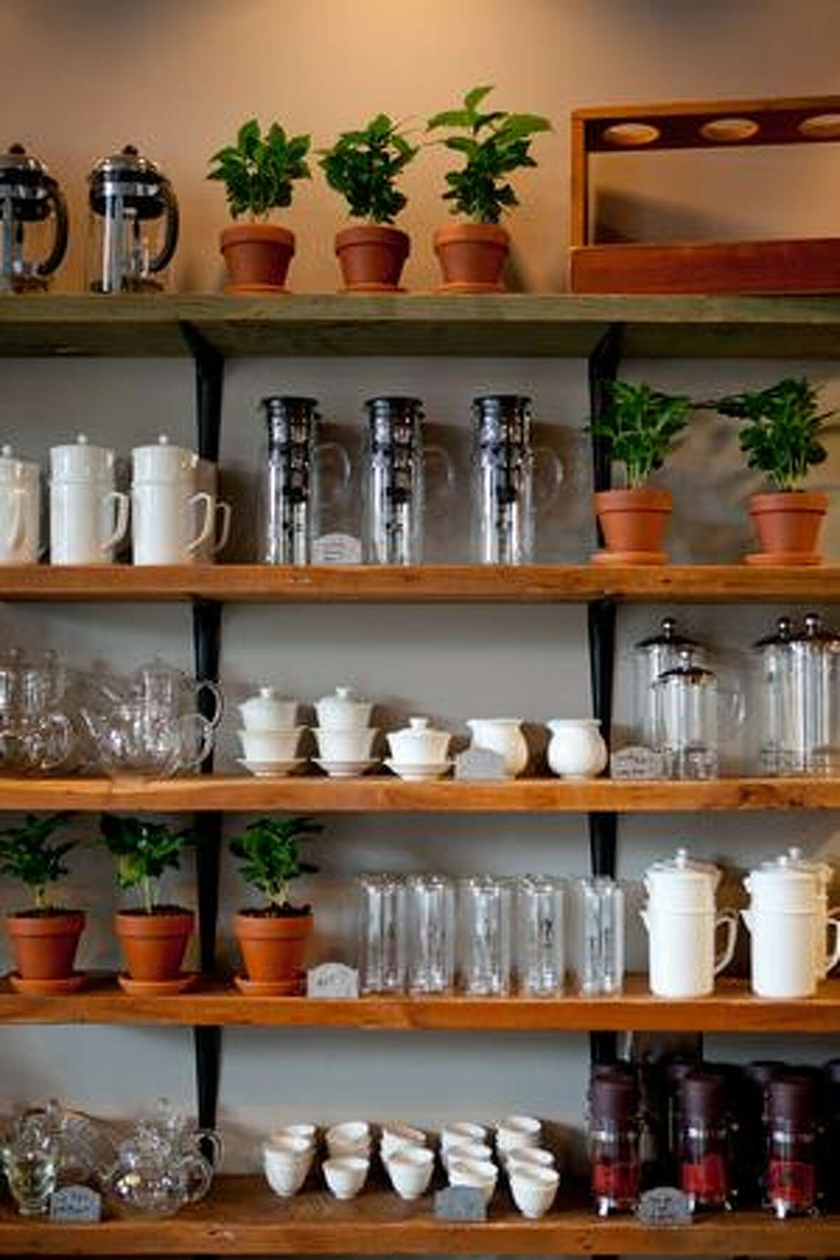 Shelves are shown at Starbucks' new 15th Avenue Coffee & Tea in Seattle's Capitol Hill neighborhood. The store is part of a project where Starbucks is trying to rebrand stores to blend into neighborhoods and be more of a community gathering place.
