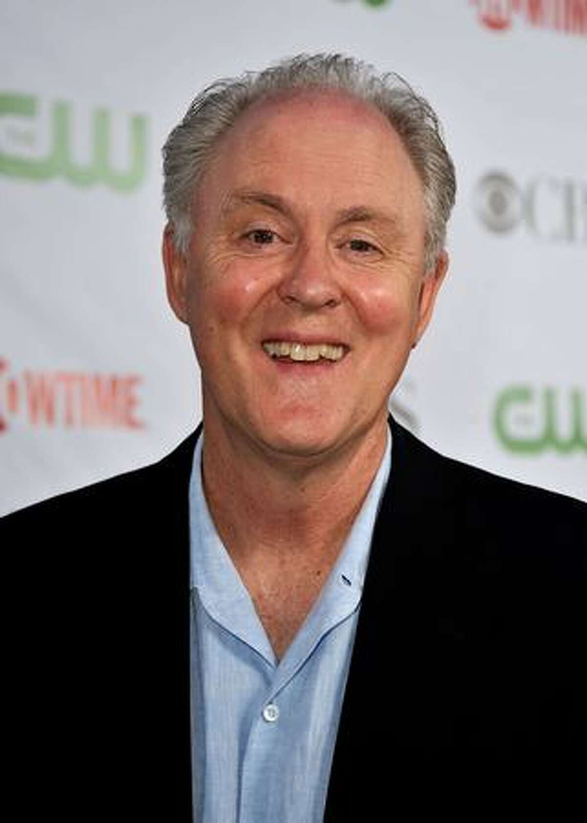 Actor John Lithgow arrives at the CBS, CW, CBS Television Studios & Showtime TCA party held at the Huntington Library in Pasadena, California.