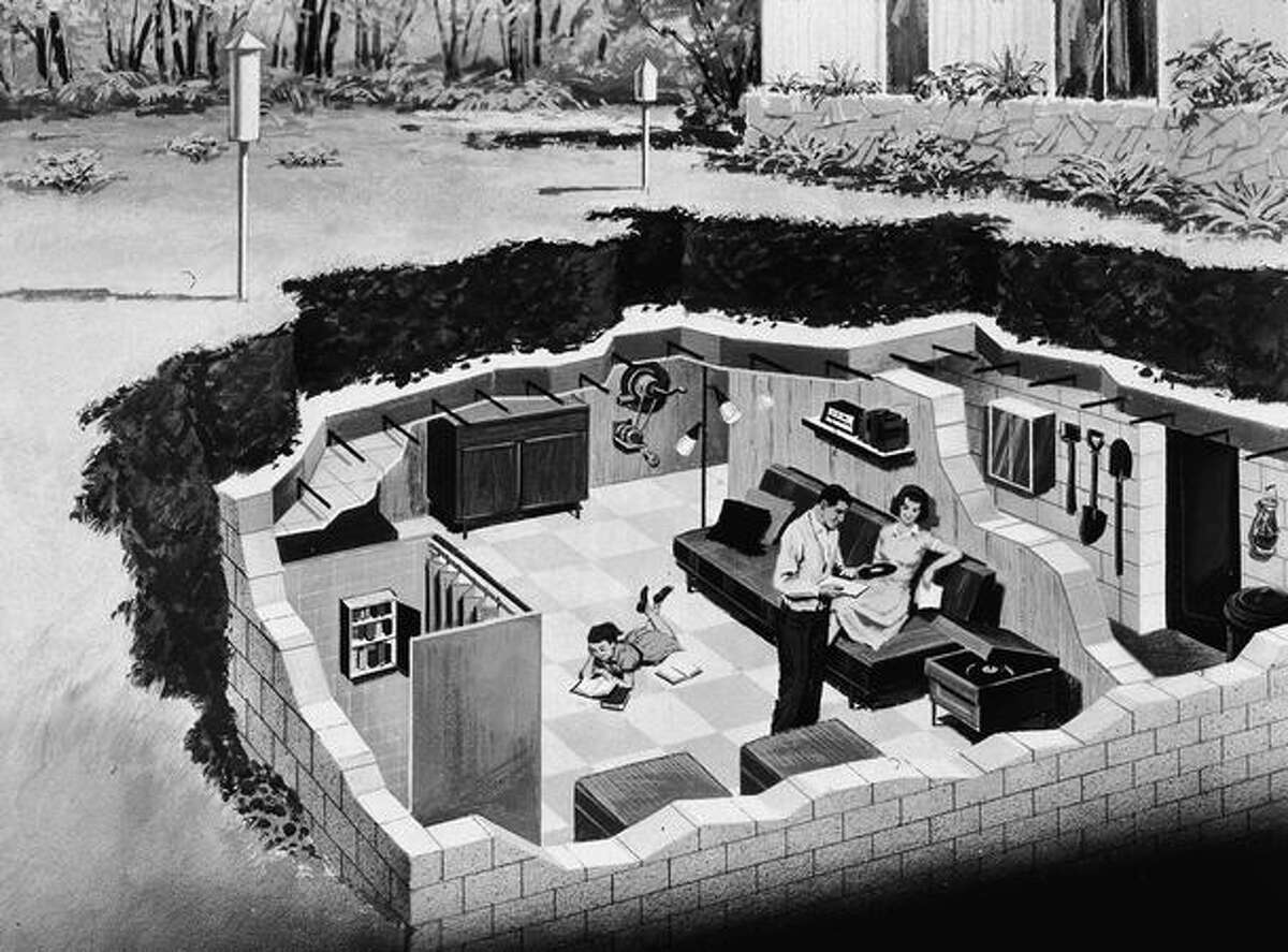 Illustration depicting a family in their backyard, underground bomb shelter, early 1960s. (Photo by Hulton Archive/Getty Images)