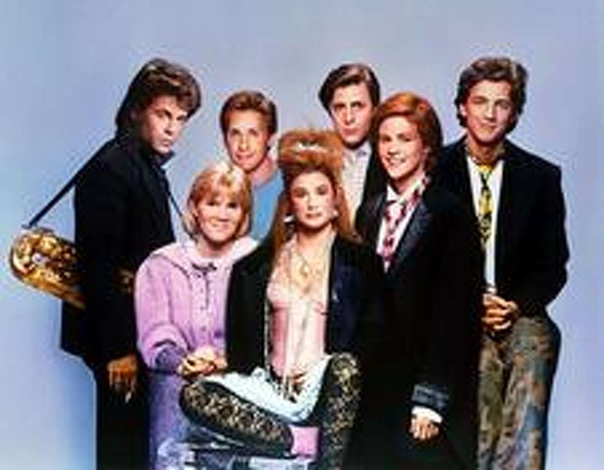 Demi Moore (seated, middle) in the movie "St. Elmo's Fire" in 1985.