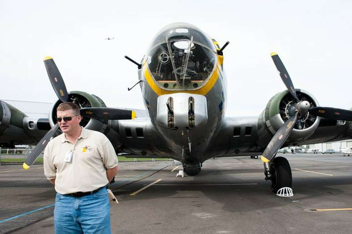 Liberty Foundation pilot John Shuttleworth gives a brief history of the foundation's restored Boeing B-17 bomber "Liberty Belle" before flights at Boeing Field, in Seattle.
