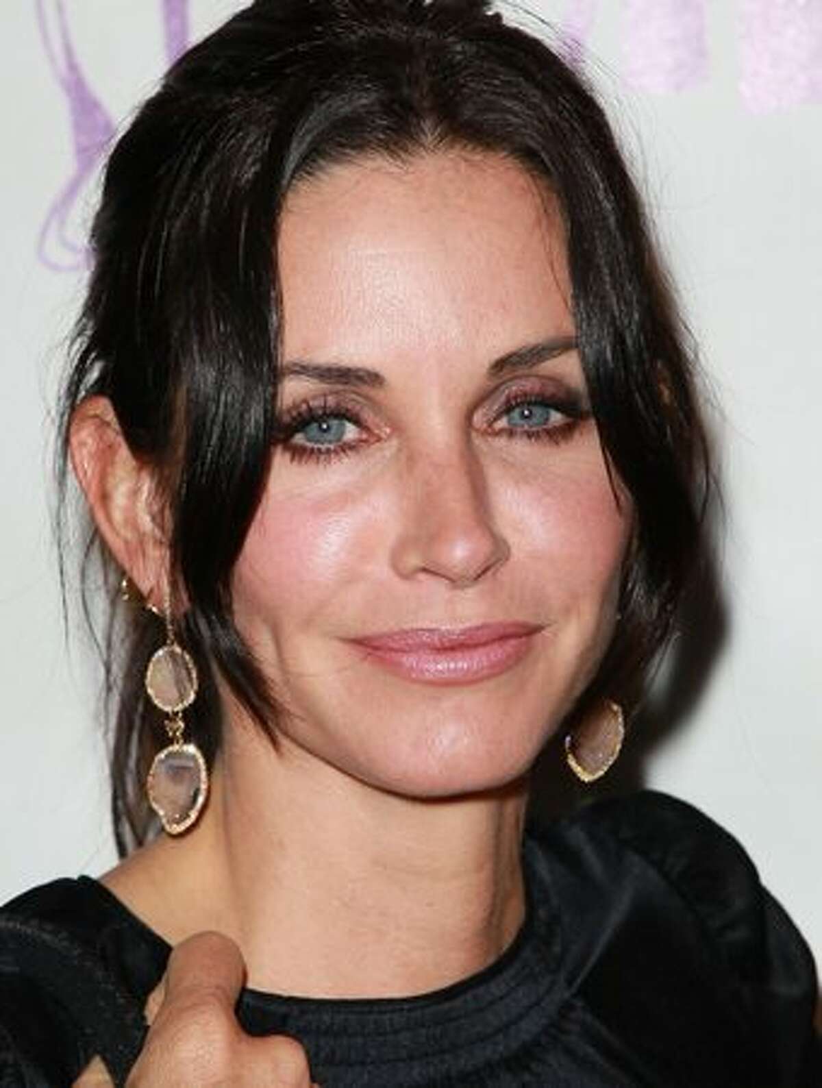 Actress Courteney Cox attends the 15th Annual Los Angeles Antique Show Opening Night Preview Party benefiting P.S. ARTS at Barker Hanger on April 21, 2010 in Santa Monica, California.