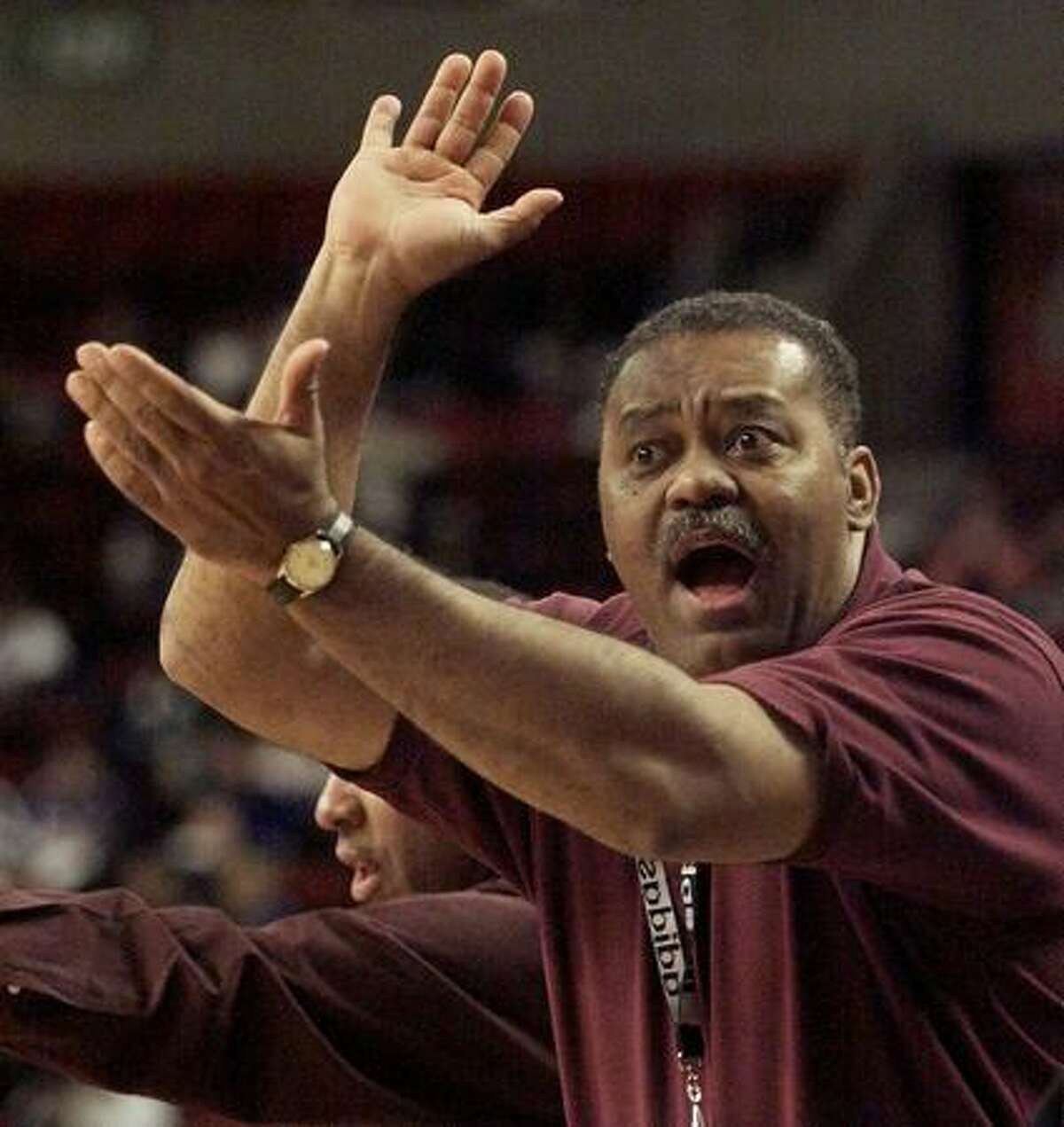 O'Dea basketball coach Phil Lumpkin scolds the referees during his team's loss to the Franklin Quakers, Jan. 17, 2000. (Mike Urban/seattlepi.com file)