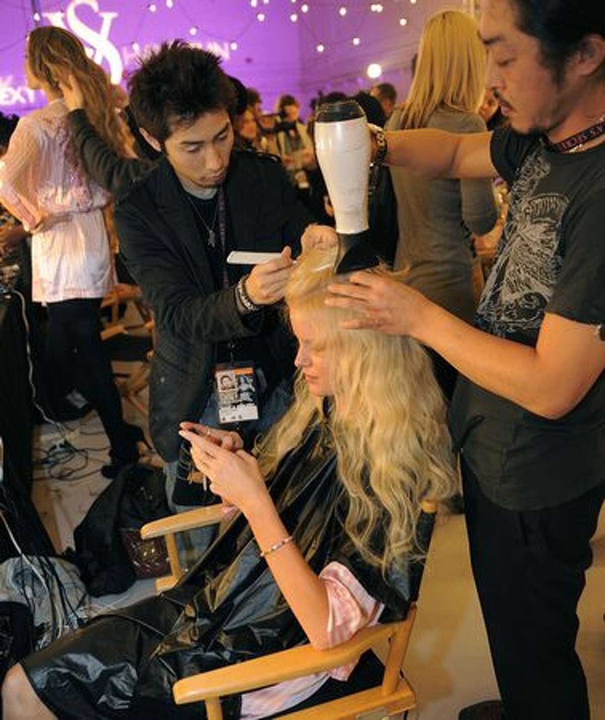 Victoria's Secret model Caroline Winberg backstage in hair and make-up before the start of the Victoria's Secret Fashion Show in New York.