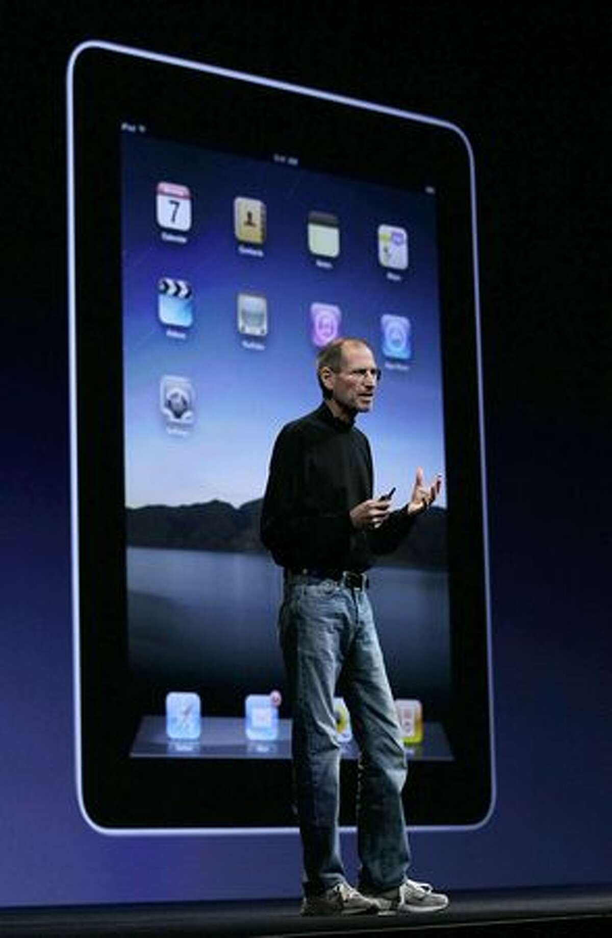 Apple CEO Steve Jobs talks about the iPad before showing the new iPhone during his opening keynote at the 2010 Apple Worldwide Developers conference June 7, 2010, in San Francisco.