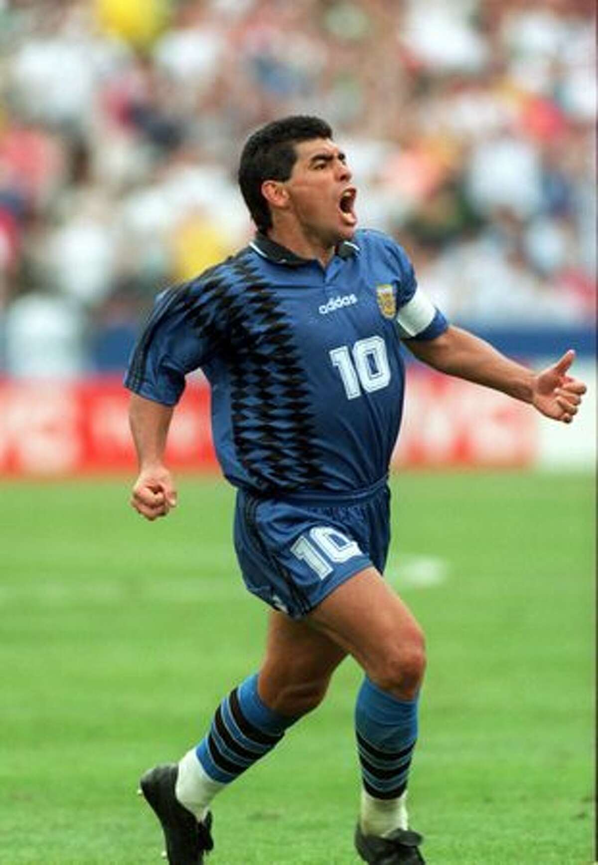 1994: Diego Maradona of Argentina celebrates scoring Argentina's third goal en route to defeating Greece 4-0 Foxboro Stadium in Massachusetts.