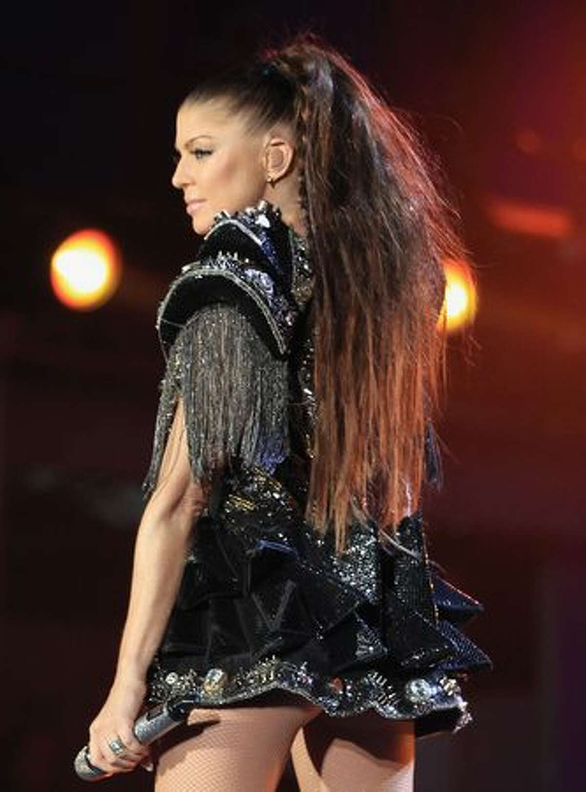 Fergie of Black Eyed Peas performs a song during the kick-off celebration concert for the 2010 FIFA World Cup at the Orlando Stadium in Soweto, South Africa on Thursday, June 10, 2010. The world championship of soccer opens in South Africa on Friday and runs through July 11.