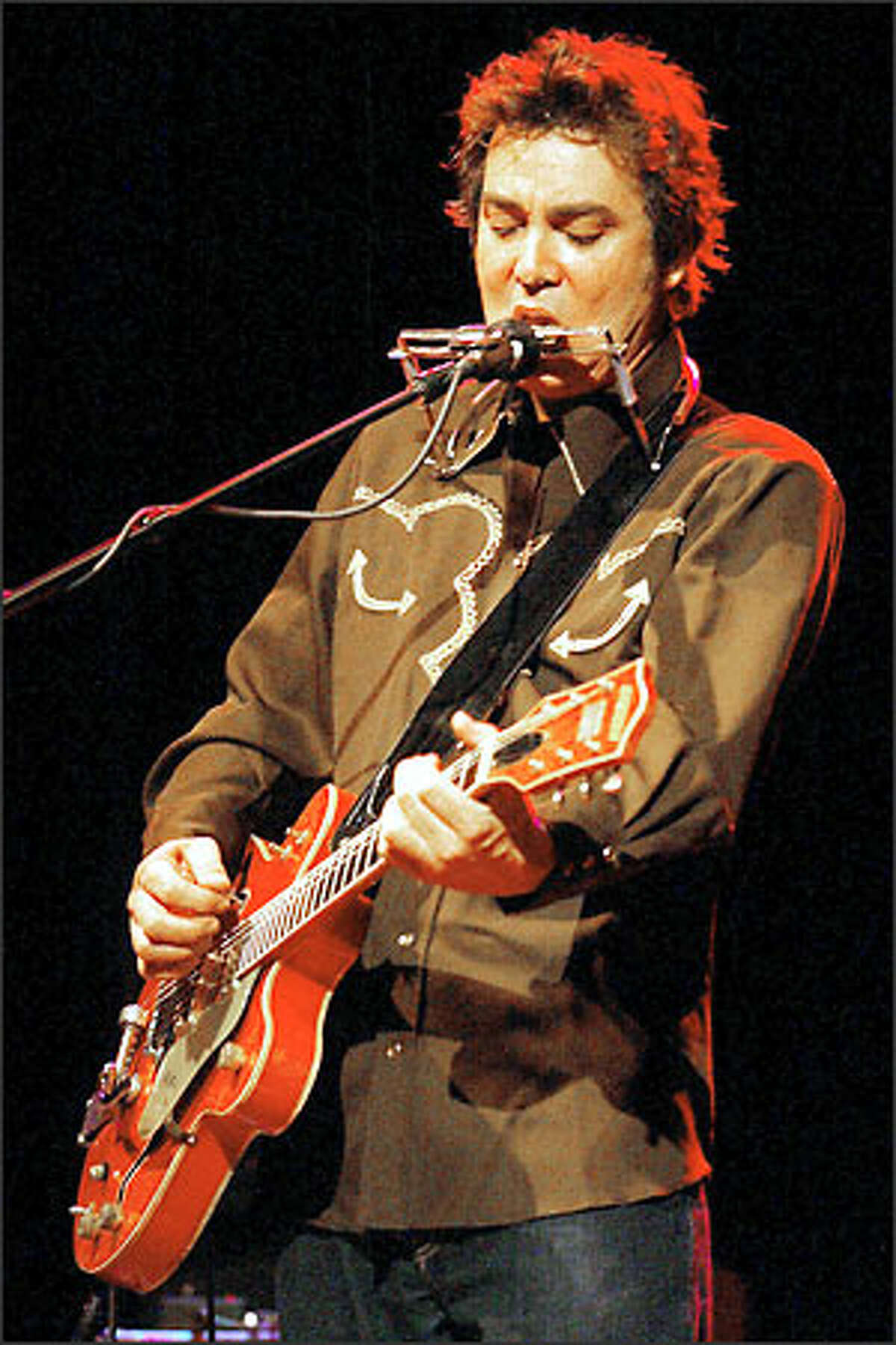 Lucinda Williams' guitarist, Doug Pettibone.