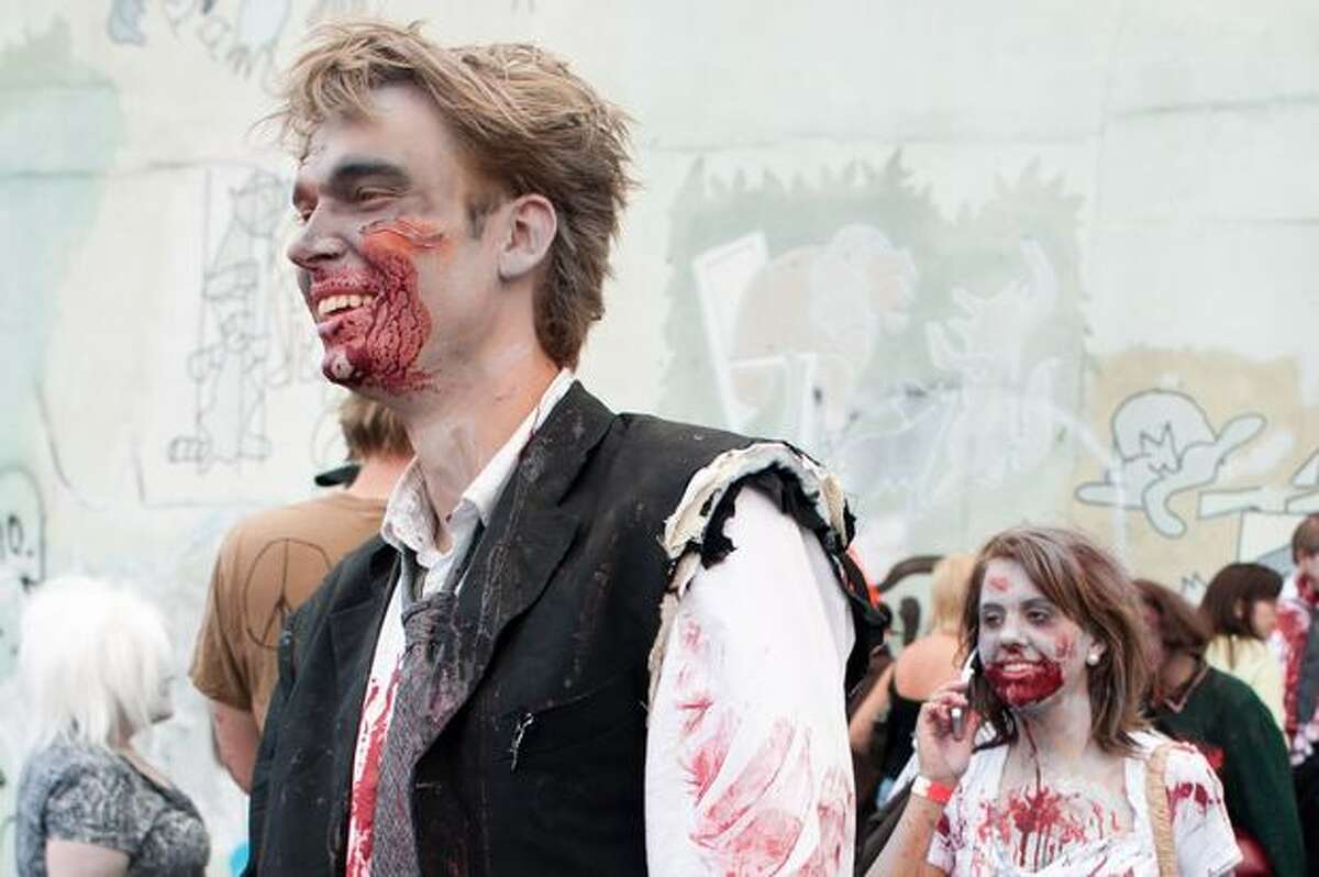 Participants dress in elaborate and bloodied costumes during the Zombie Walk in Fremont.