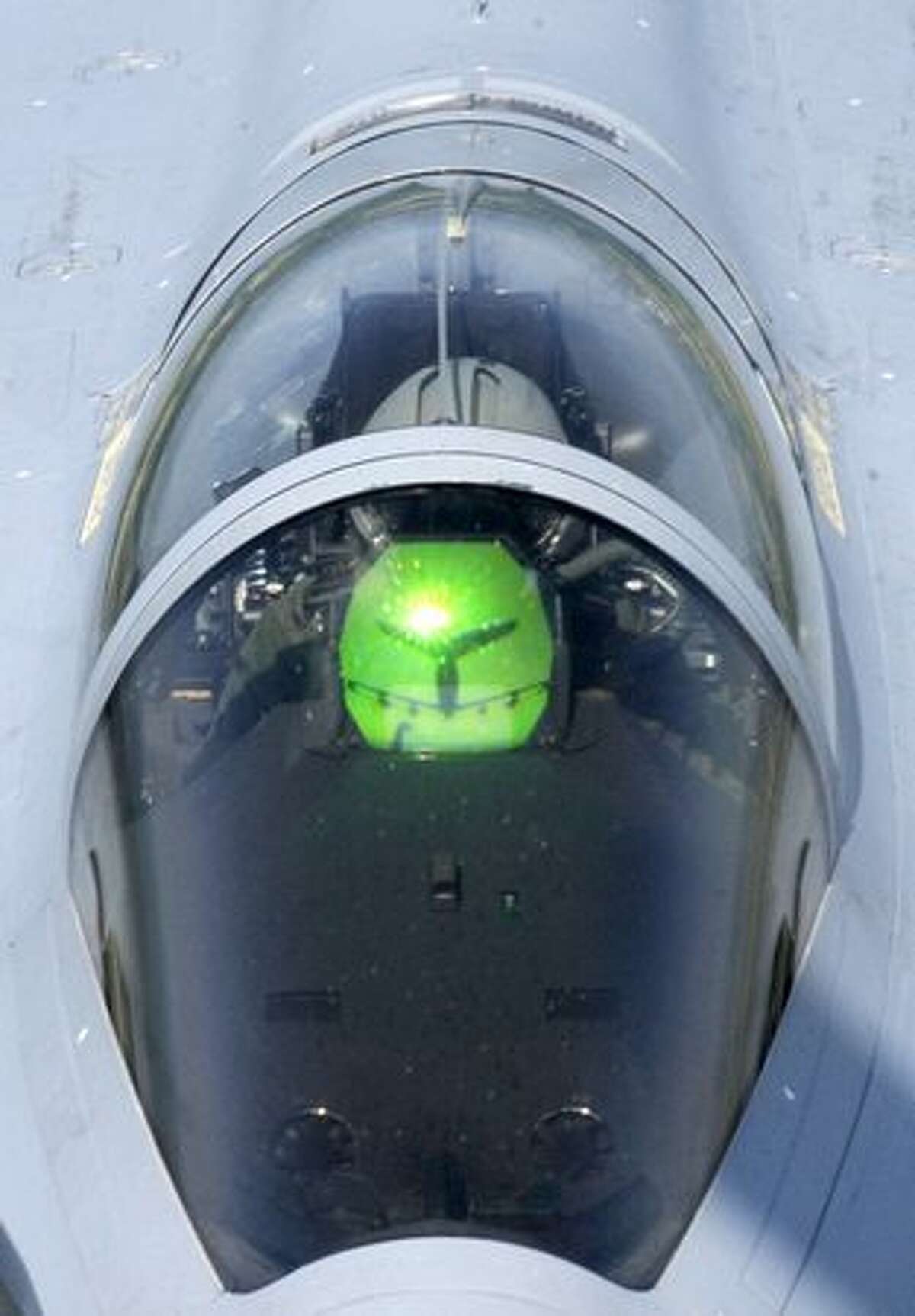 A Boeing C-135 stratolifter is reflected on the heads-up display in a Rafale fighter jet on a training flight over Chateaudun, France ahead of the July 14 Bastille Day military air parade in Paris.
