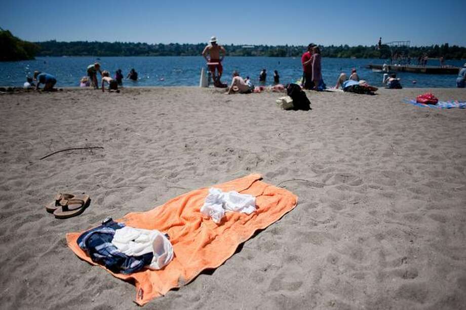 European Nudist Beach Voyeur - Nearly nude man fights to keep photographing sunbathing ...