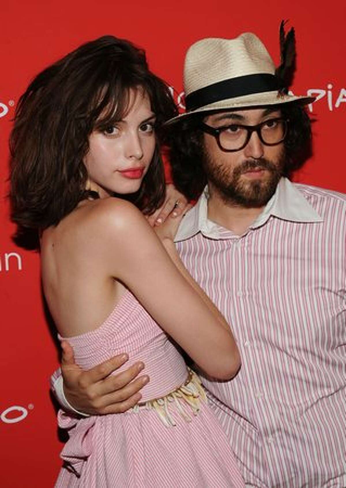 Musician Sean Lennon (R) and Charlotte Kemp Muhl attend the premiere of "The Extra Man" at Village East Cinema in New York City.