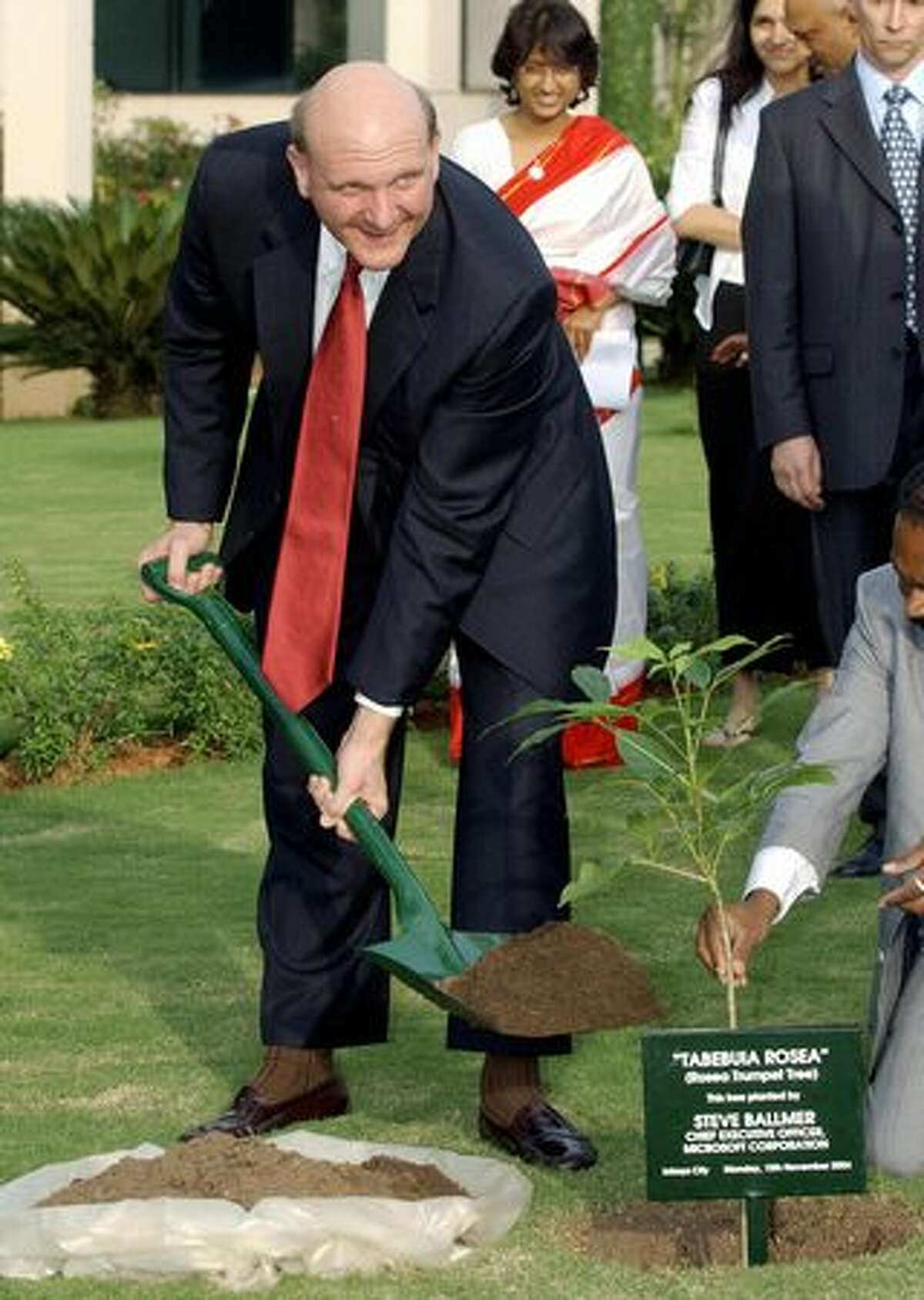 Ballmer helps plant a sapling at the Infosys campus Nov. 15, 2004, in Electronic City, Bangalore, India. Ballmer's Microsoft announced it would join with Indian software firm Infosys Technologies to provide software and consulting to manufacturing, banking and automobile companies and the companies will initially invest eight million dollars to develop a portfolio of services for companies worldwide.