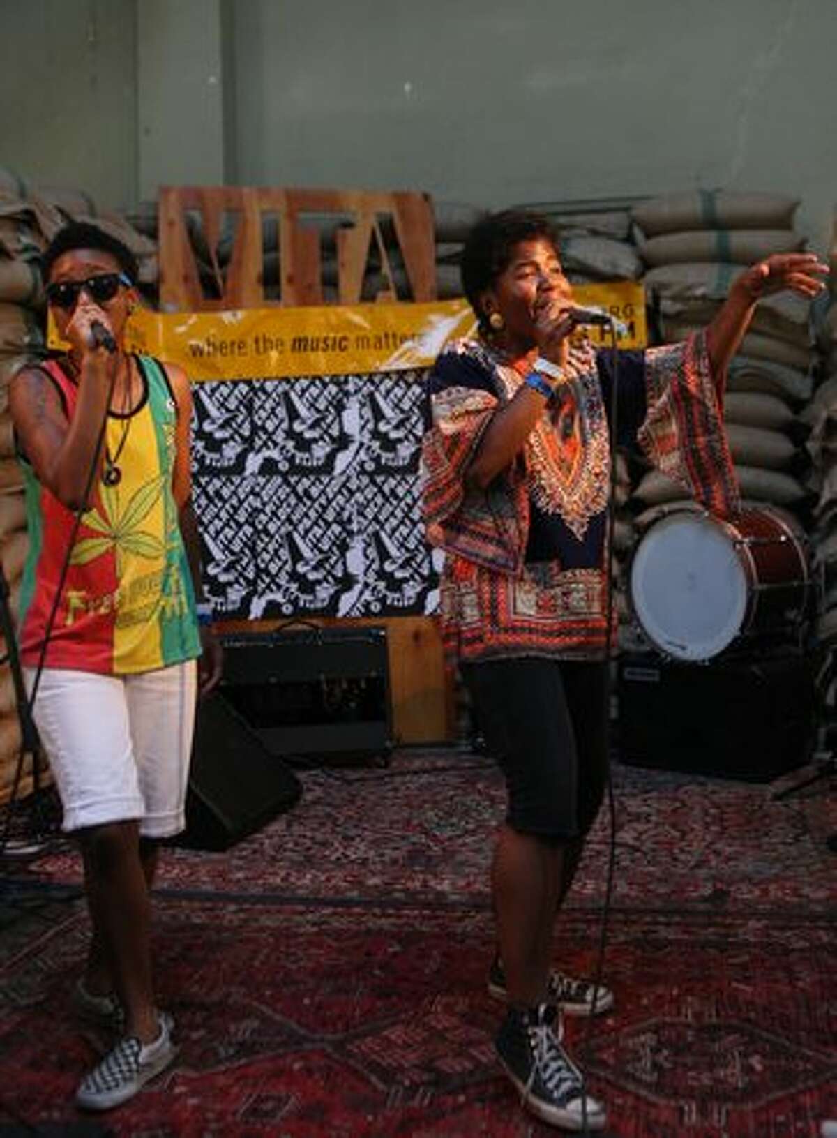 THEESatisfaction perfroms in the bean room at Cafe Vita, during the Capitol Hill Block Party.