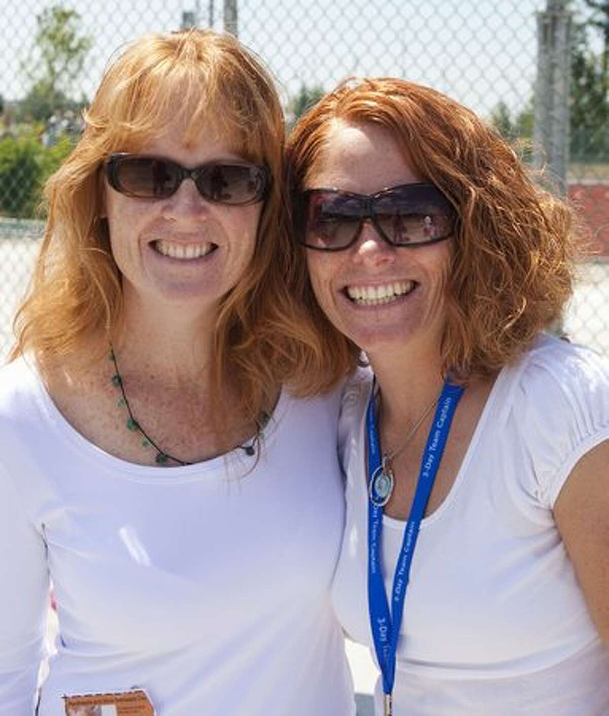 Kathy Kinard, left, and Angela Huber helped break the Guinness World Record for the largest gathering of natural redheads at Redheads and More Redheads Day in Sammamish.