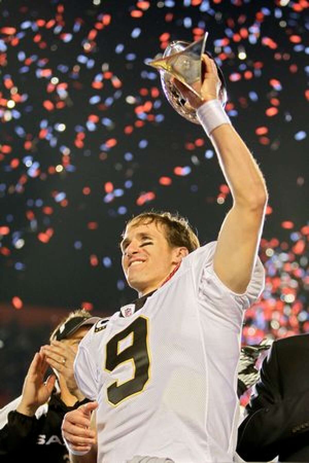 Drew Brees with the Vince Lombardi Trophy Super Bowl XLIV 