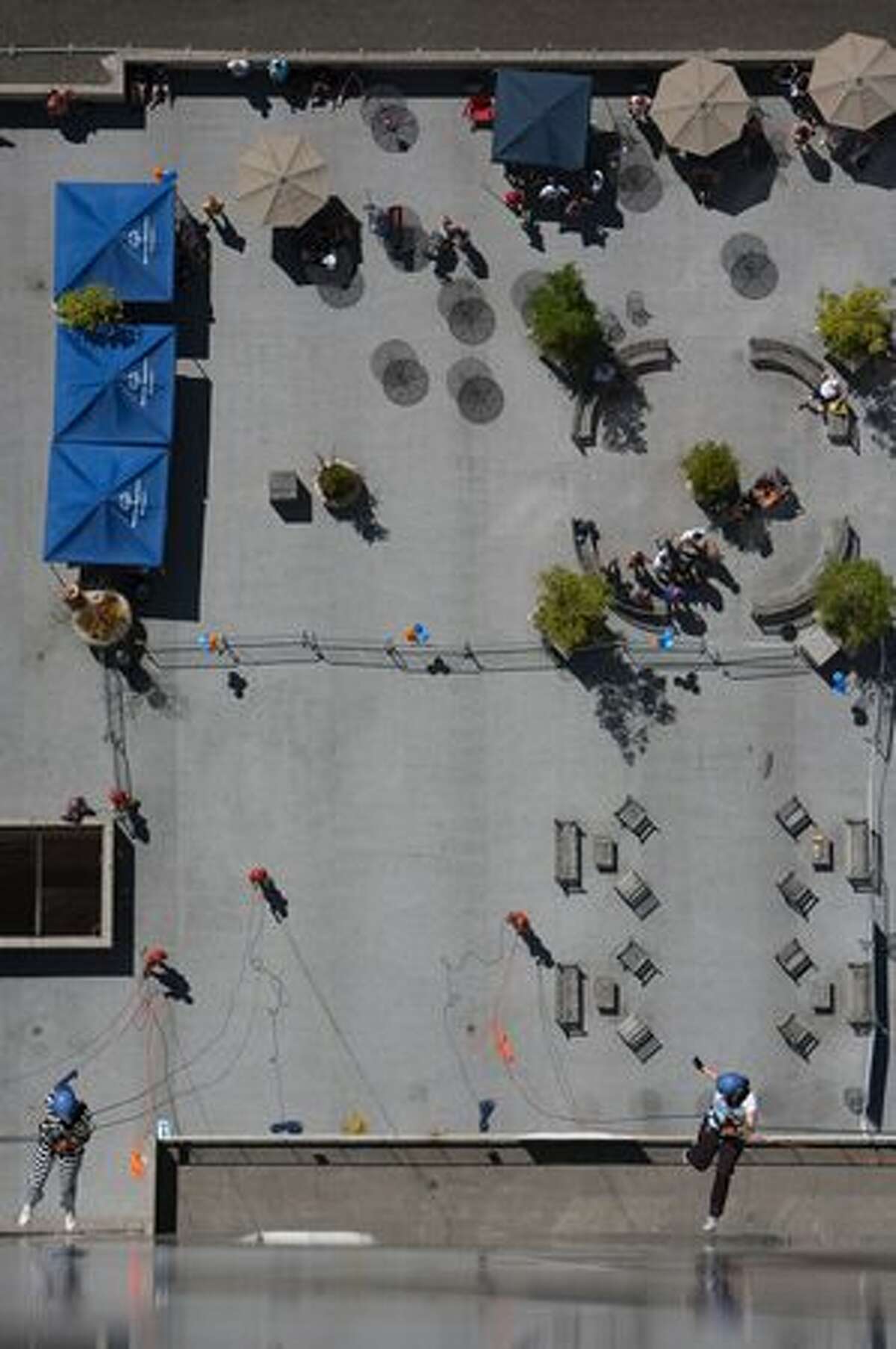 Rappellers descend during "Over the Edge," a fundraiser for Special Olympics Washington.