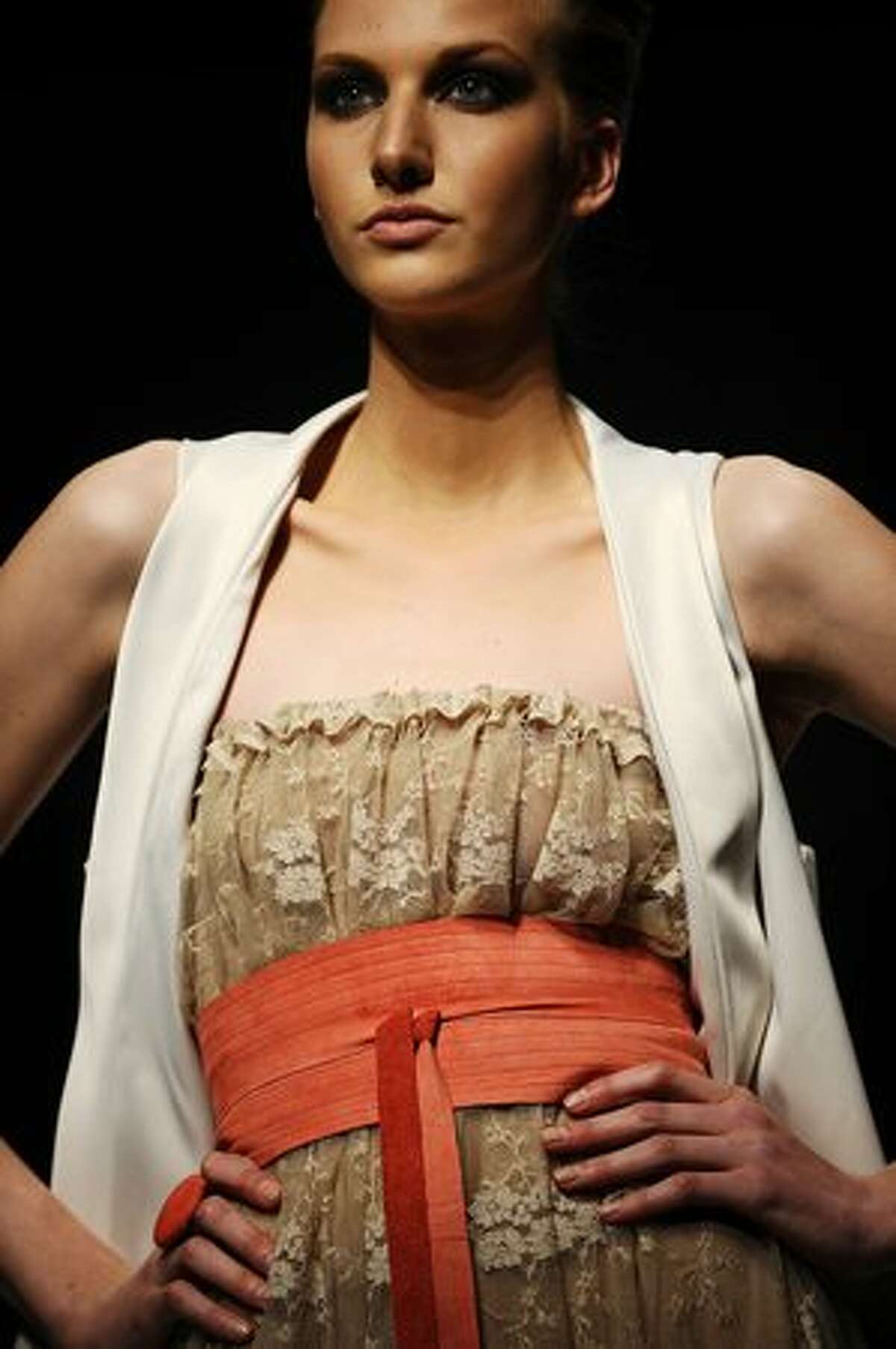 A model showcases a creation by designer "Michelle Ludek" on August 12, 2010 during the Cape Town fashion week at the Cape Town International Convention Center in Cape Town, South Africa.