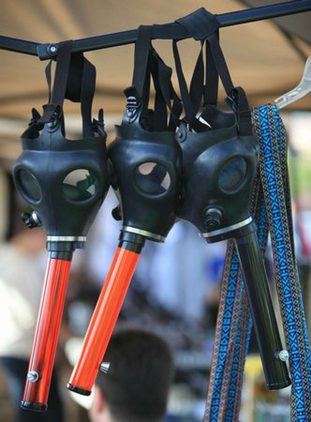 Gas masks are for sale during Seattle's Hempfest at Myrtle Edwards Park.