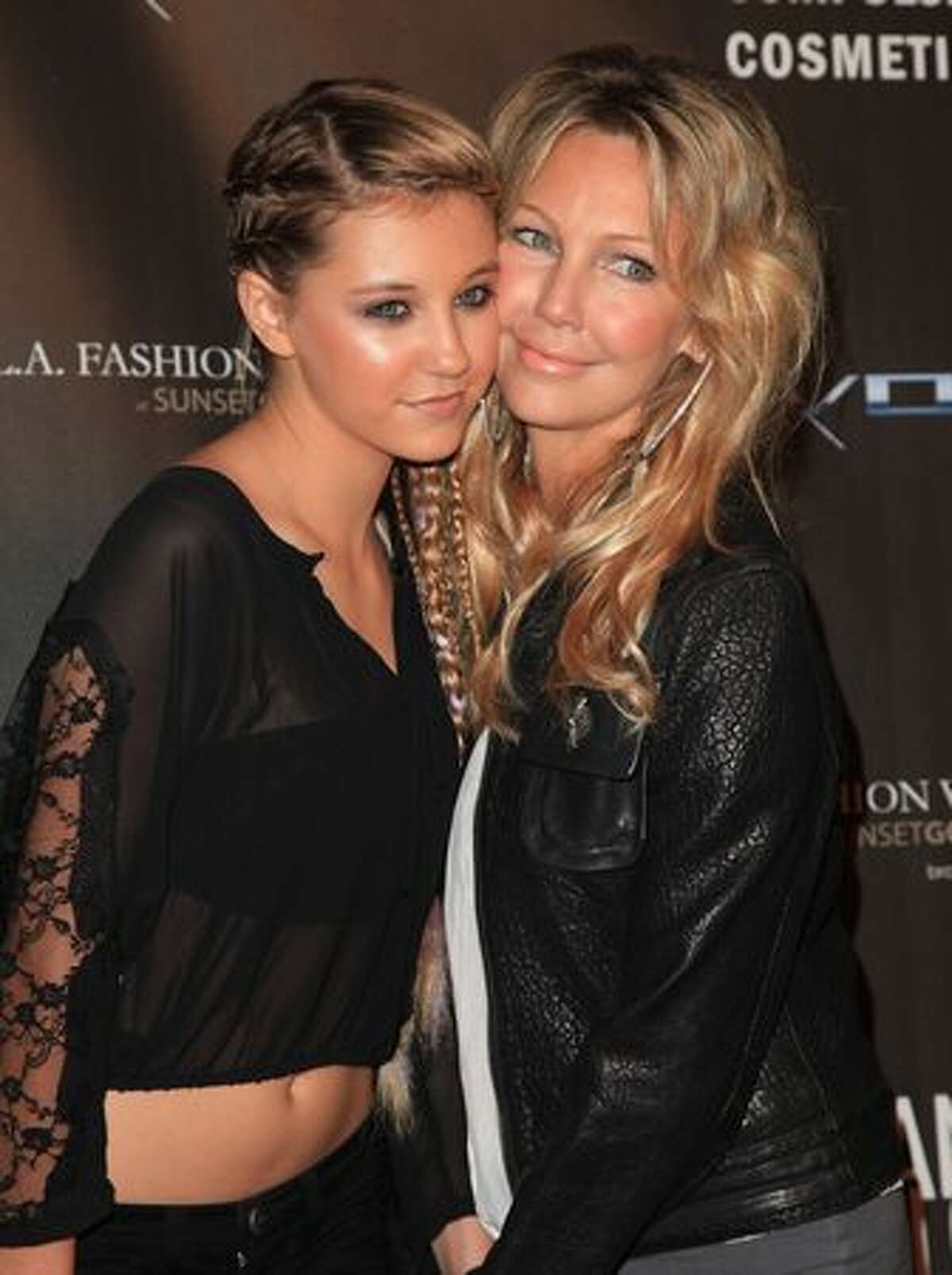 Ava Sambora and her mother Heather Locklear arrive at the WTB Spring 2011 Fashion Show at Sunset Gower Studios in Los Angeles, California.