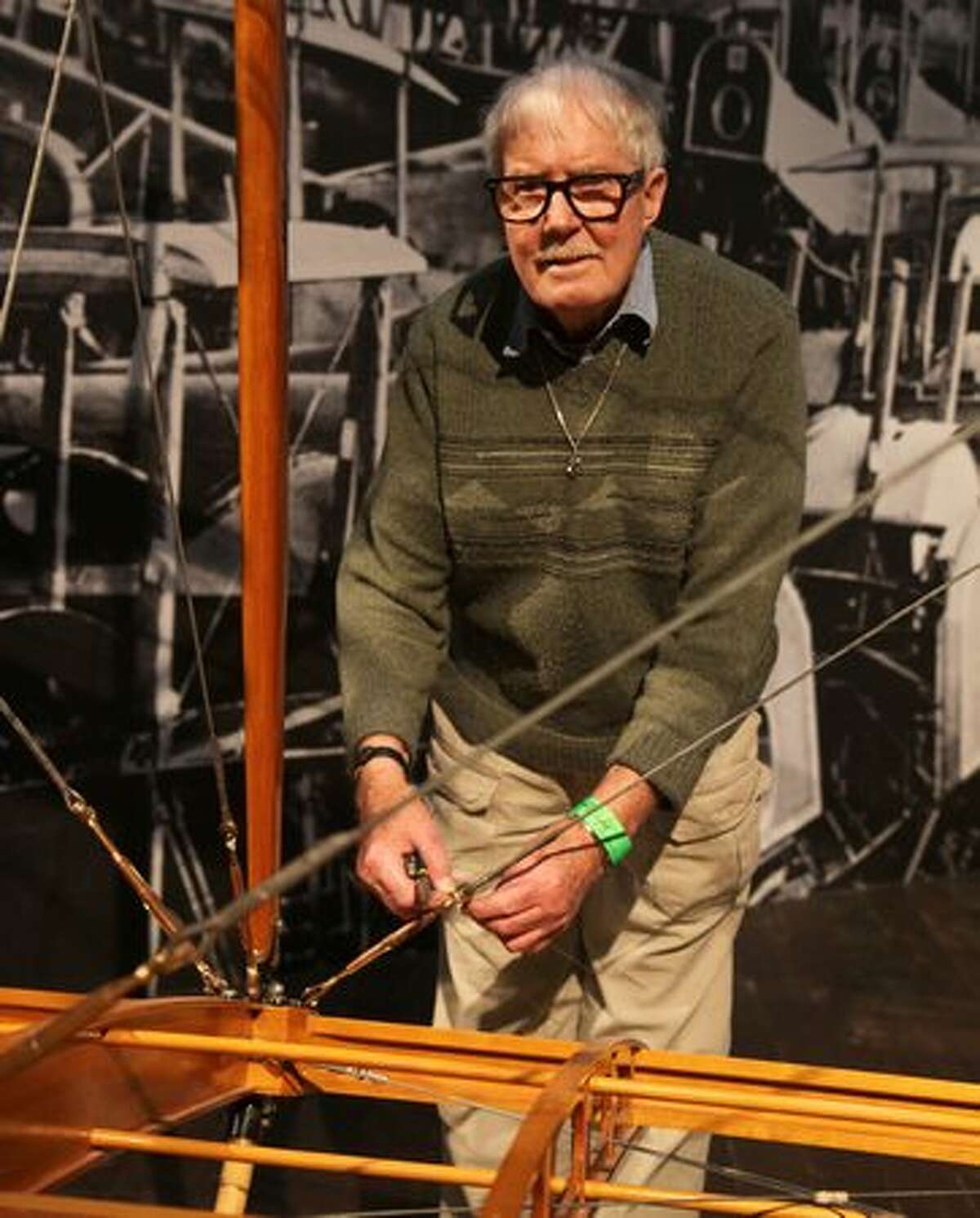 Leonard King works on the Seattle Museum of Flight's Curtiss JN-4D Jenny. King was part of the team that originally restored the Jenny in the early 1980s.